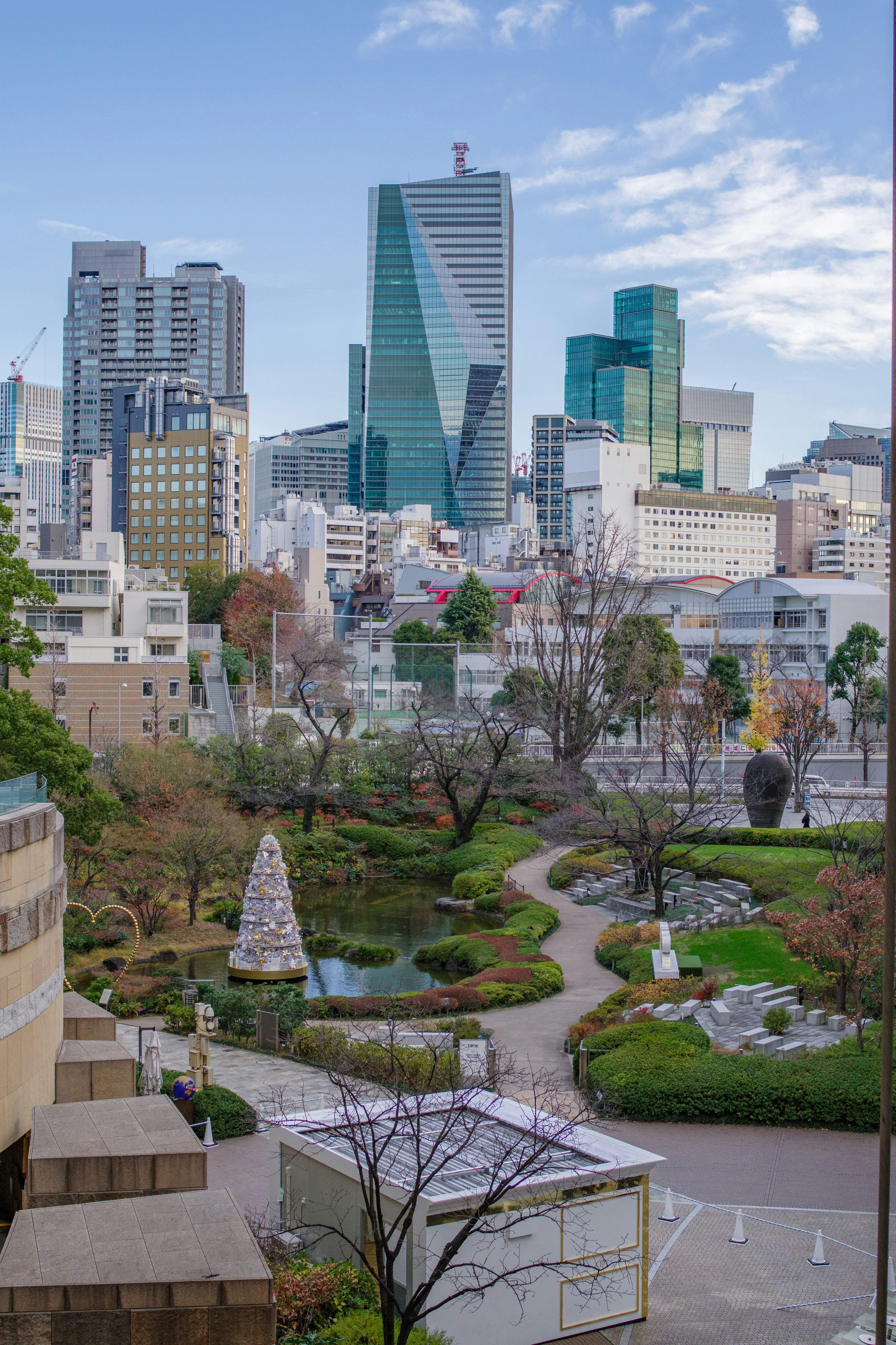 Lush park with a view of skyscrapers Urban scenery blending nature and architecture