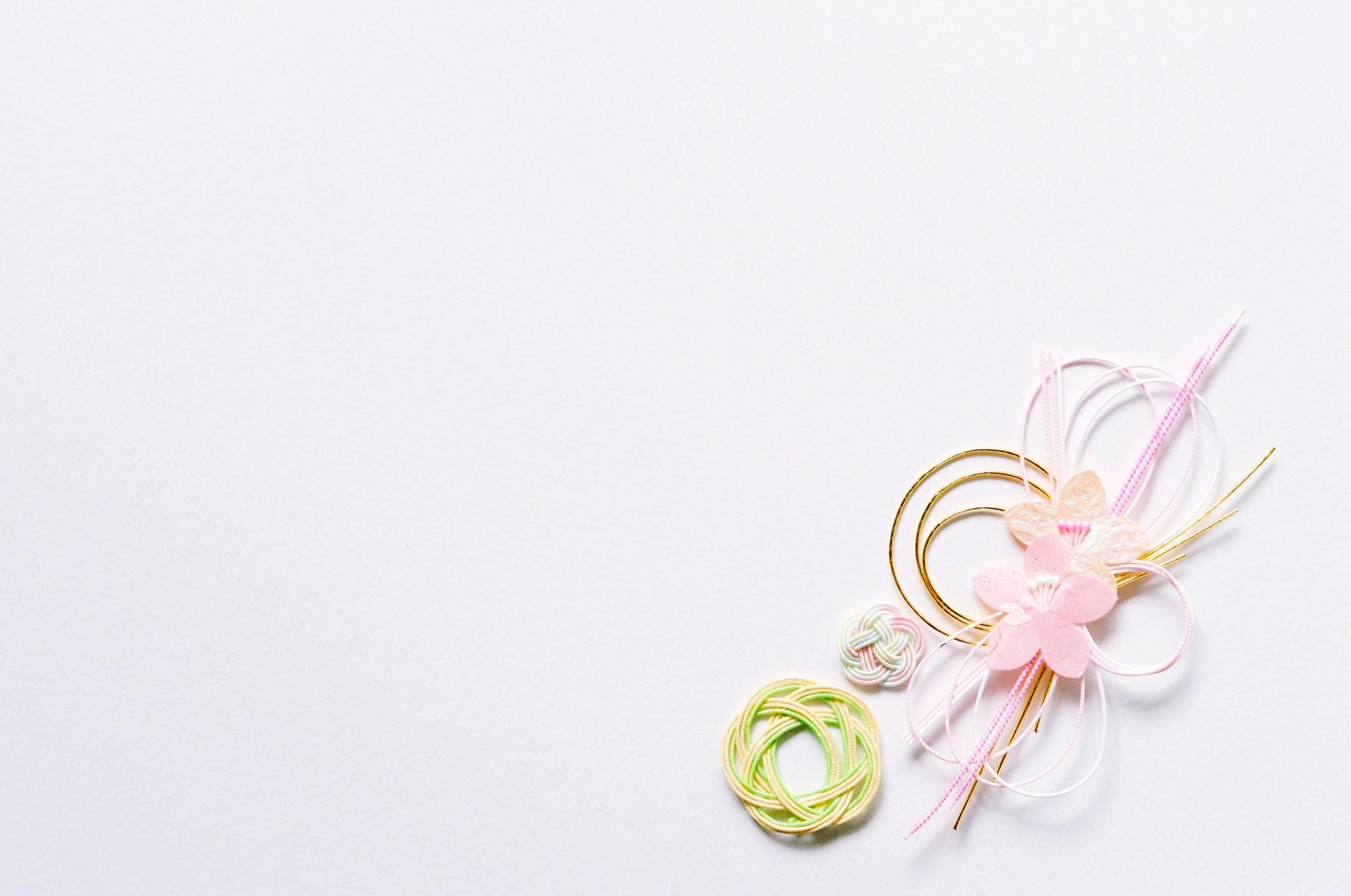 Colorful hair accessories arranged on a white background