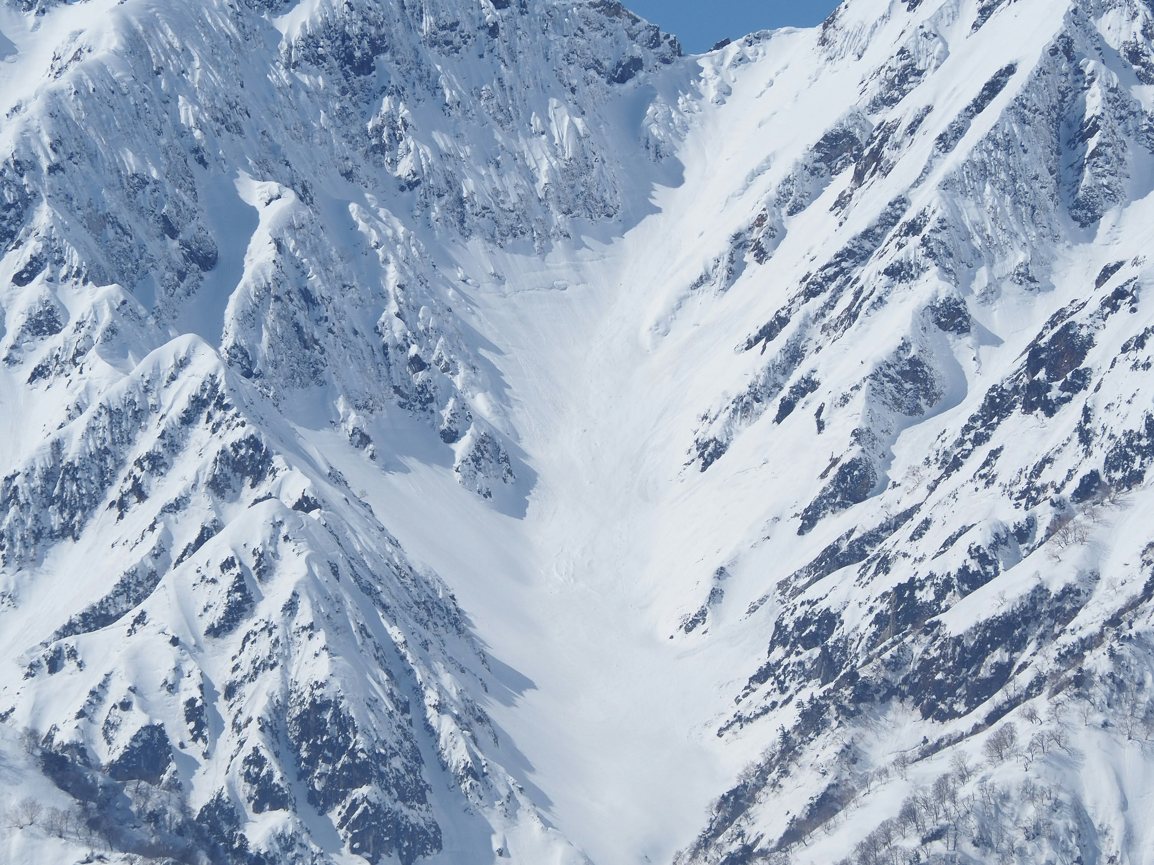 Stunning view of snow-covered mountains under a blue sky