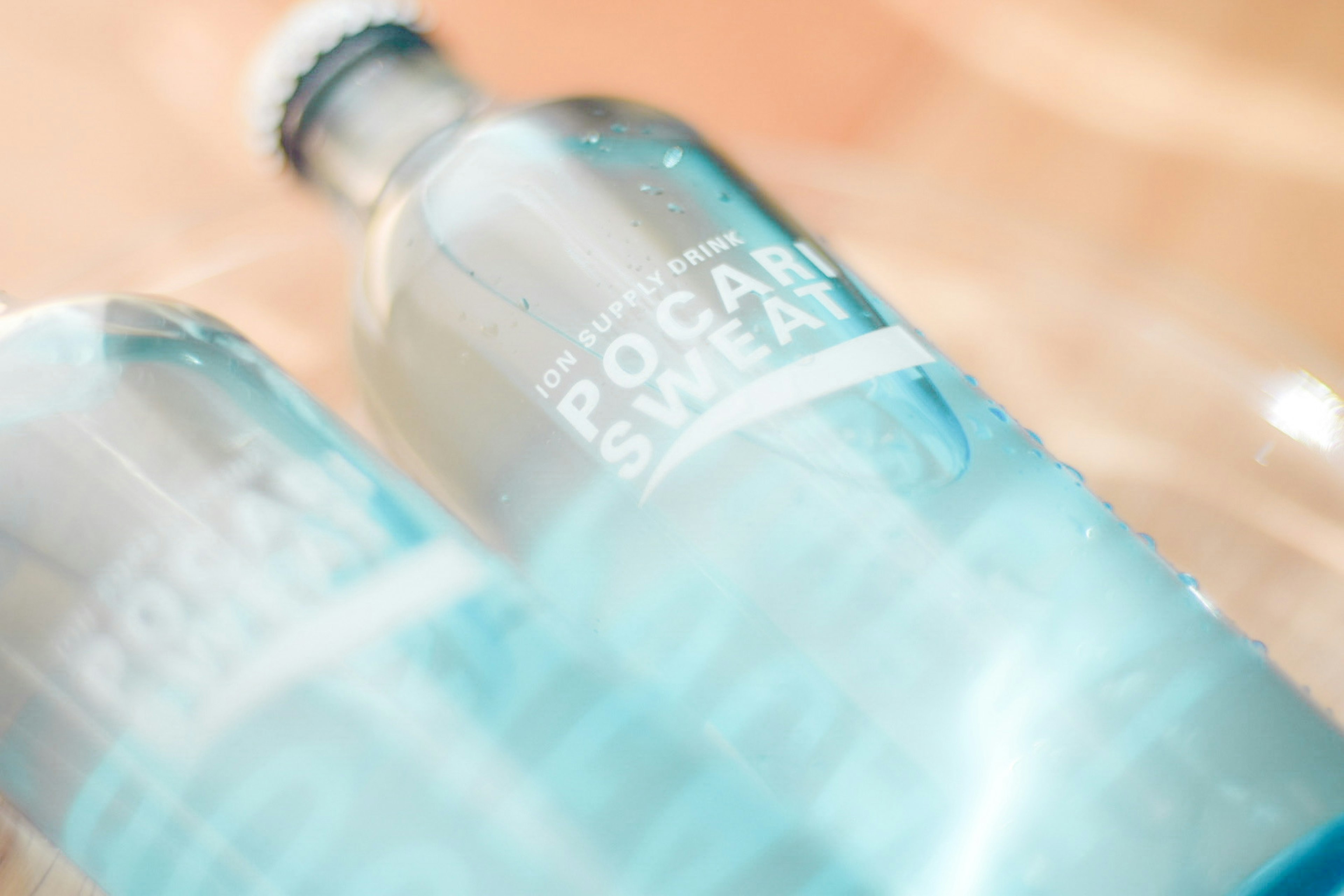 Two bottles of Pocari Sweat beverage in blue color