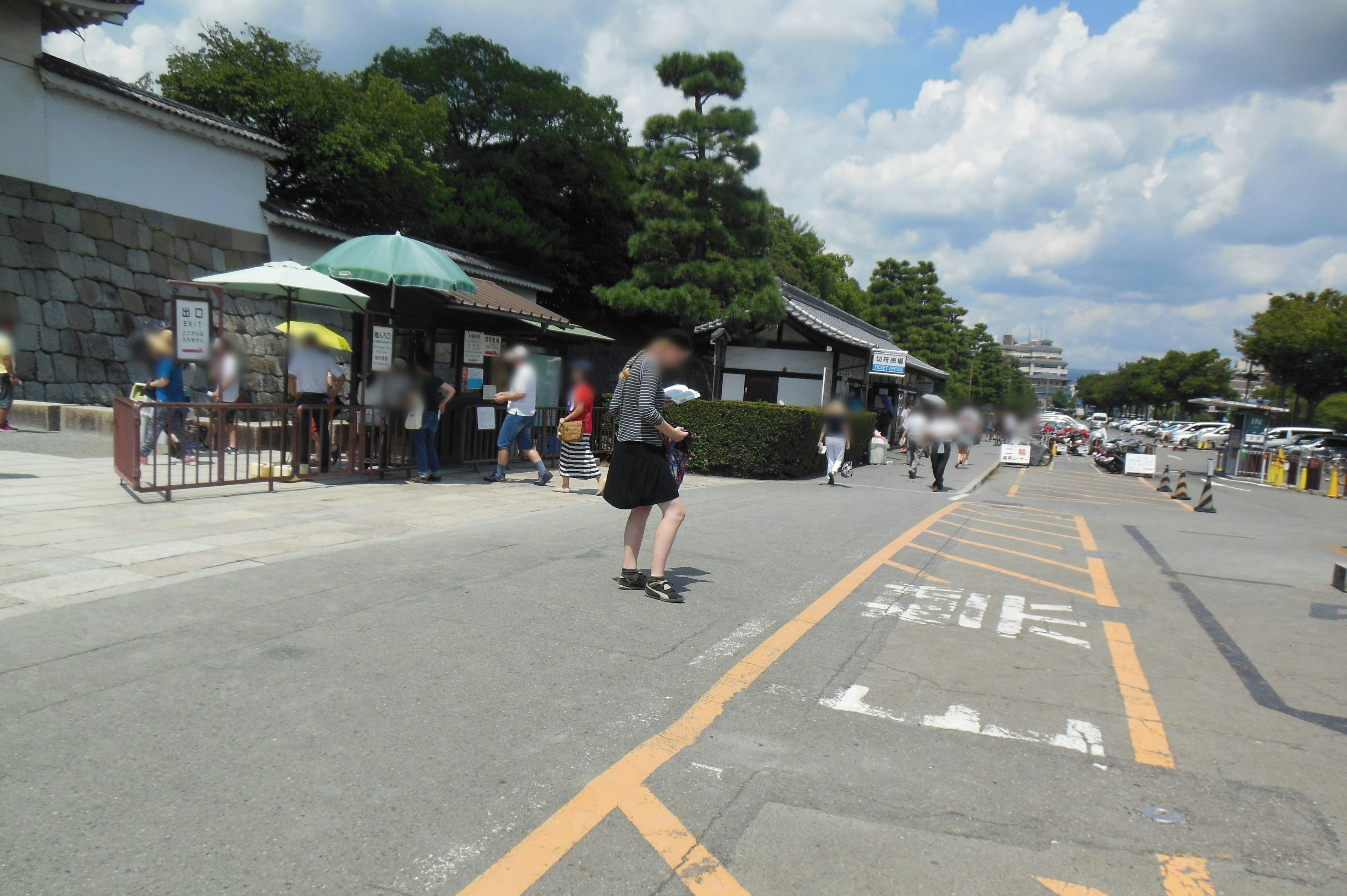 A scenic view around the Imperial Palace with people strolling