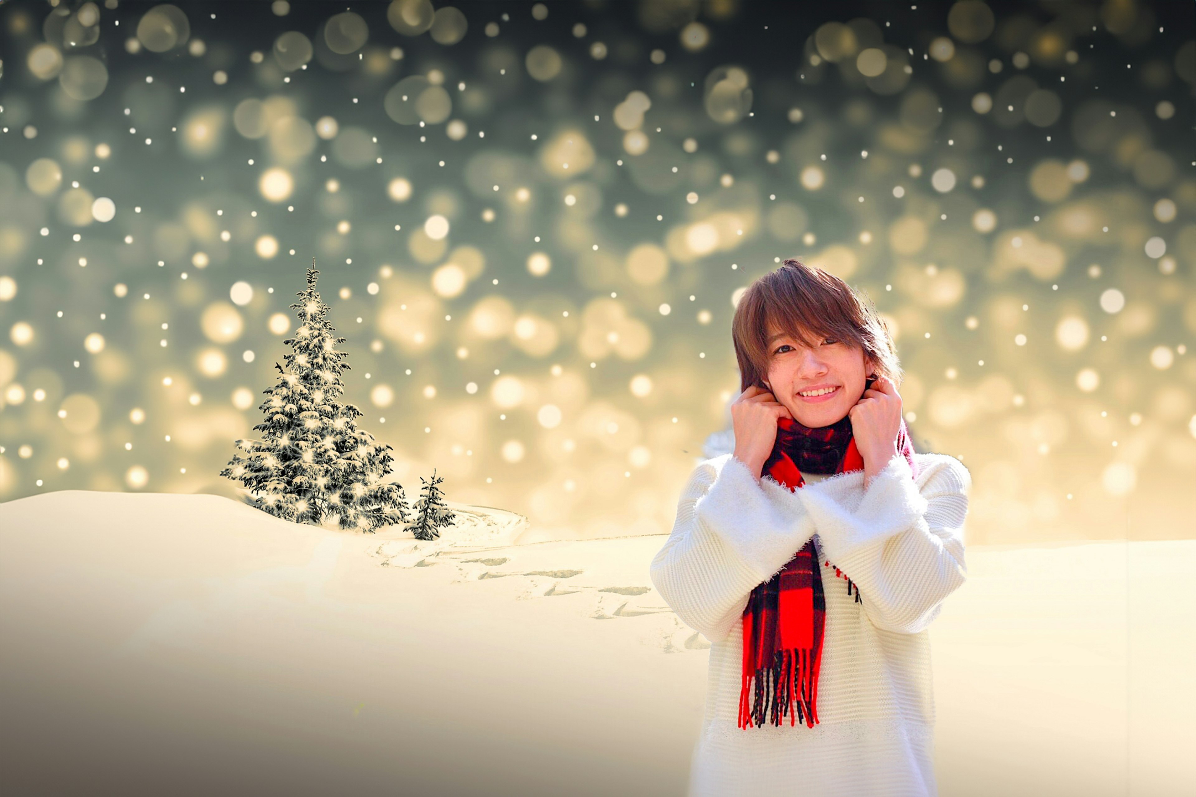 Smiling woman in winter coat with red scarf in snowy landscape