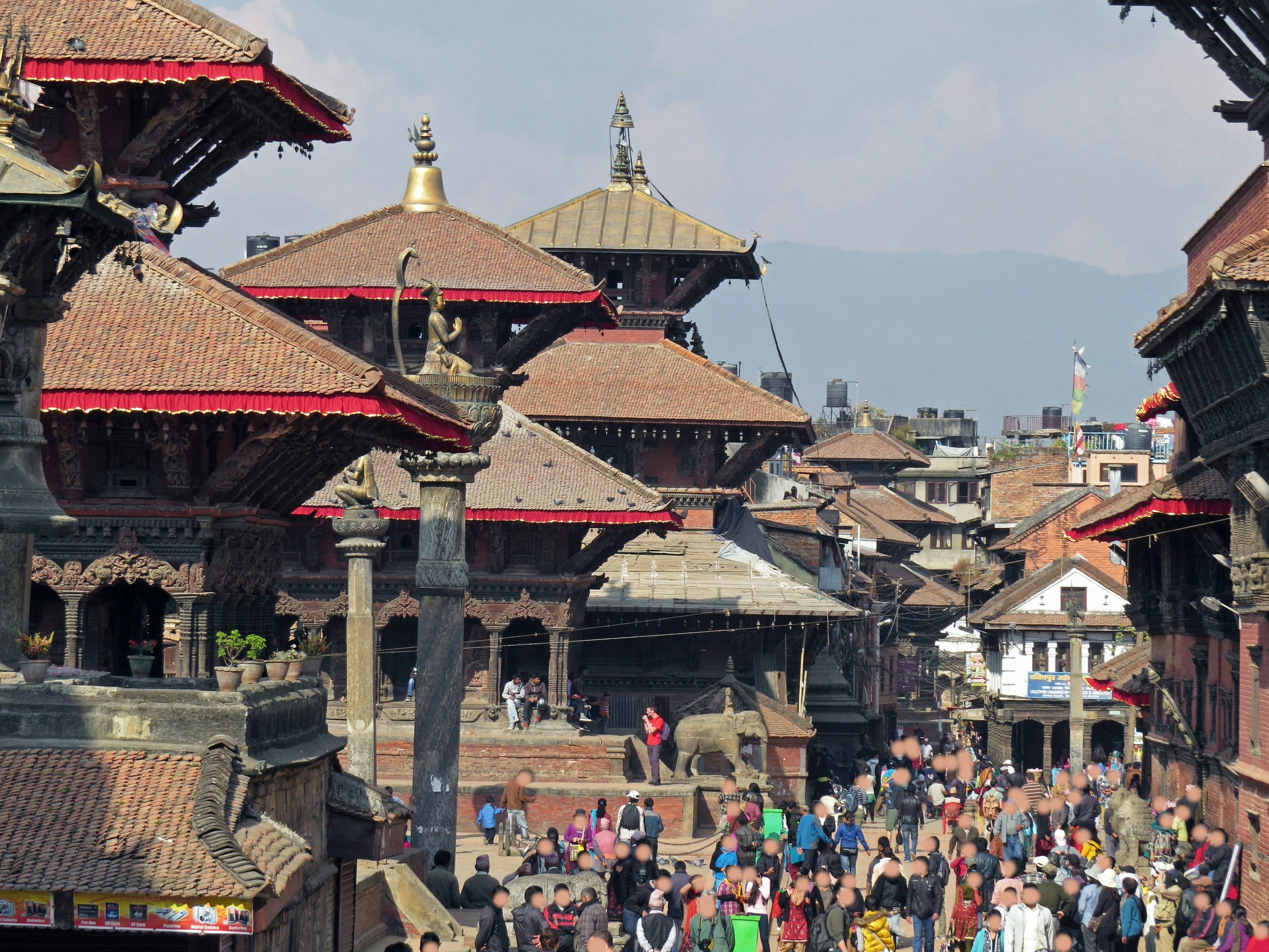 Traditional buildings and crowds in Bhaktapur Square Kathmandu