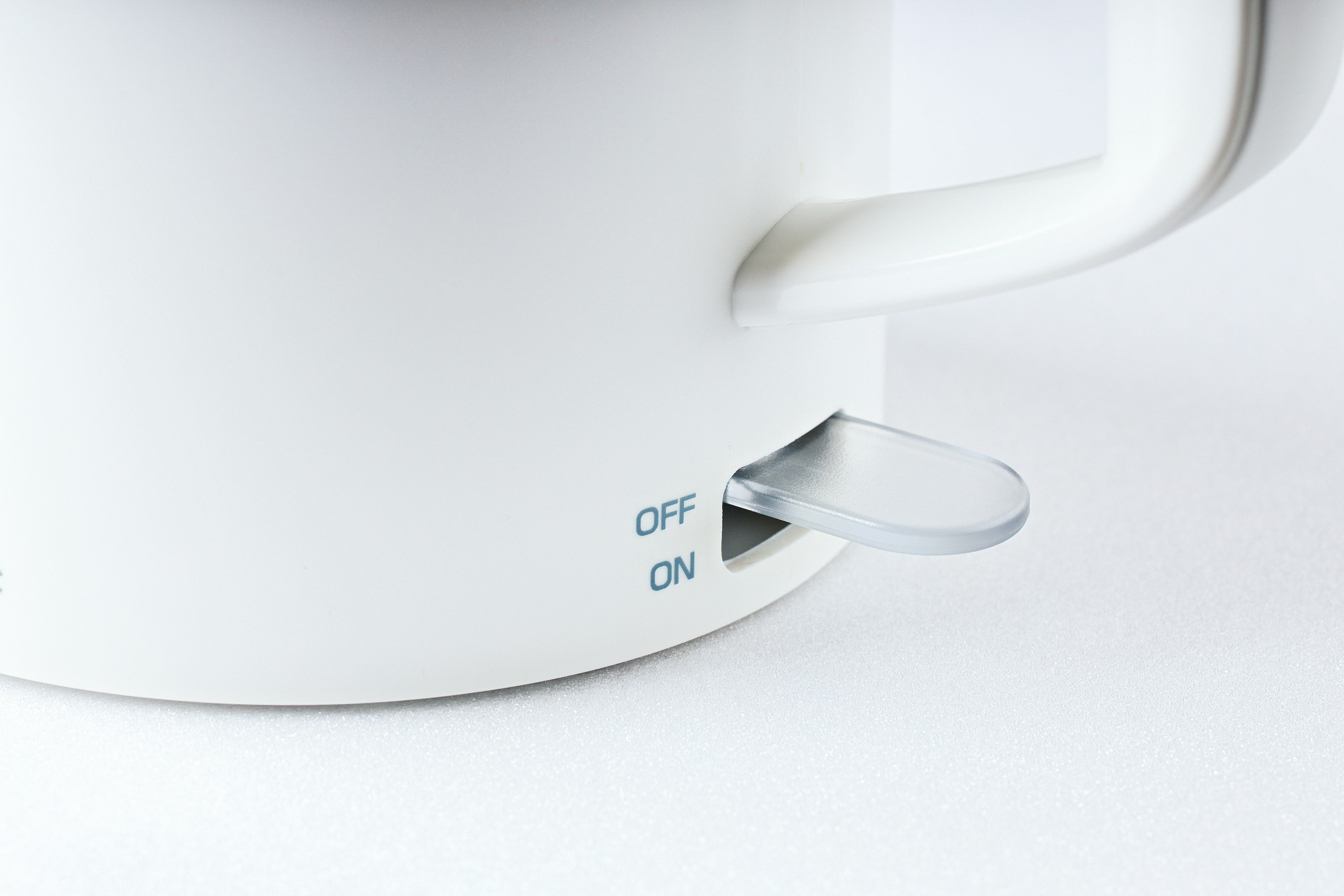 White electric kettle switch with off and on indicators