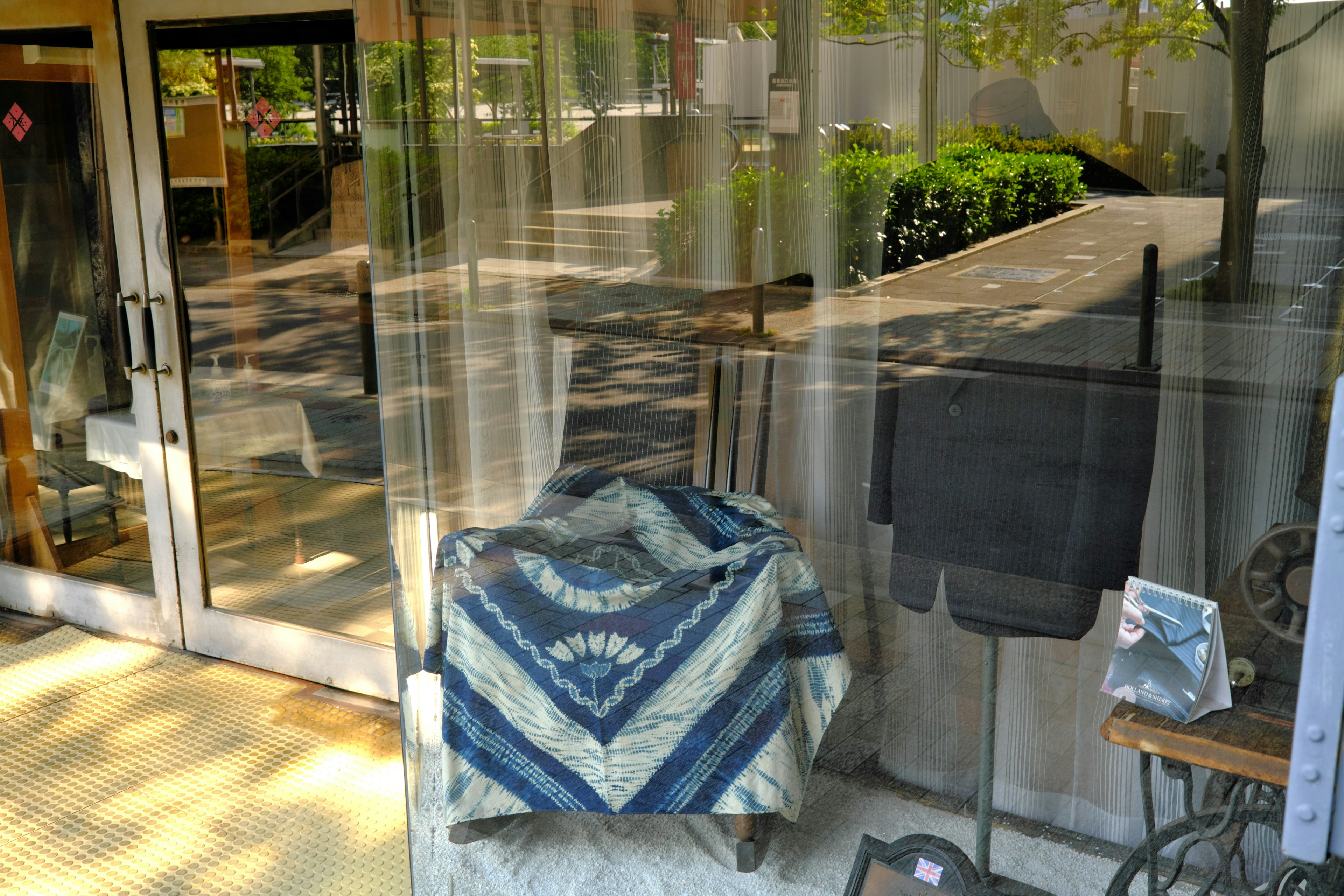 Colorful fabric displayed in a shop window