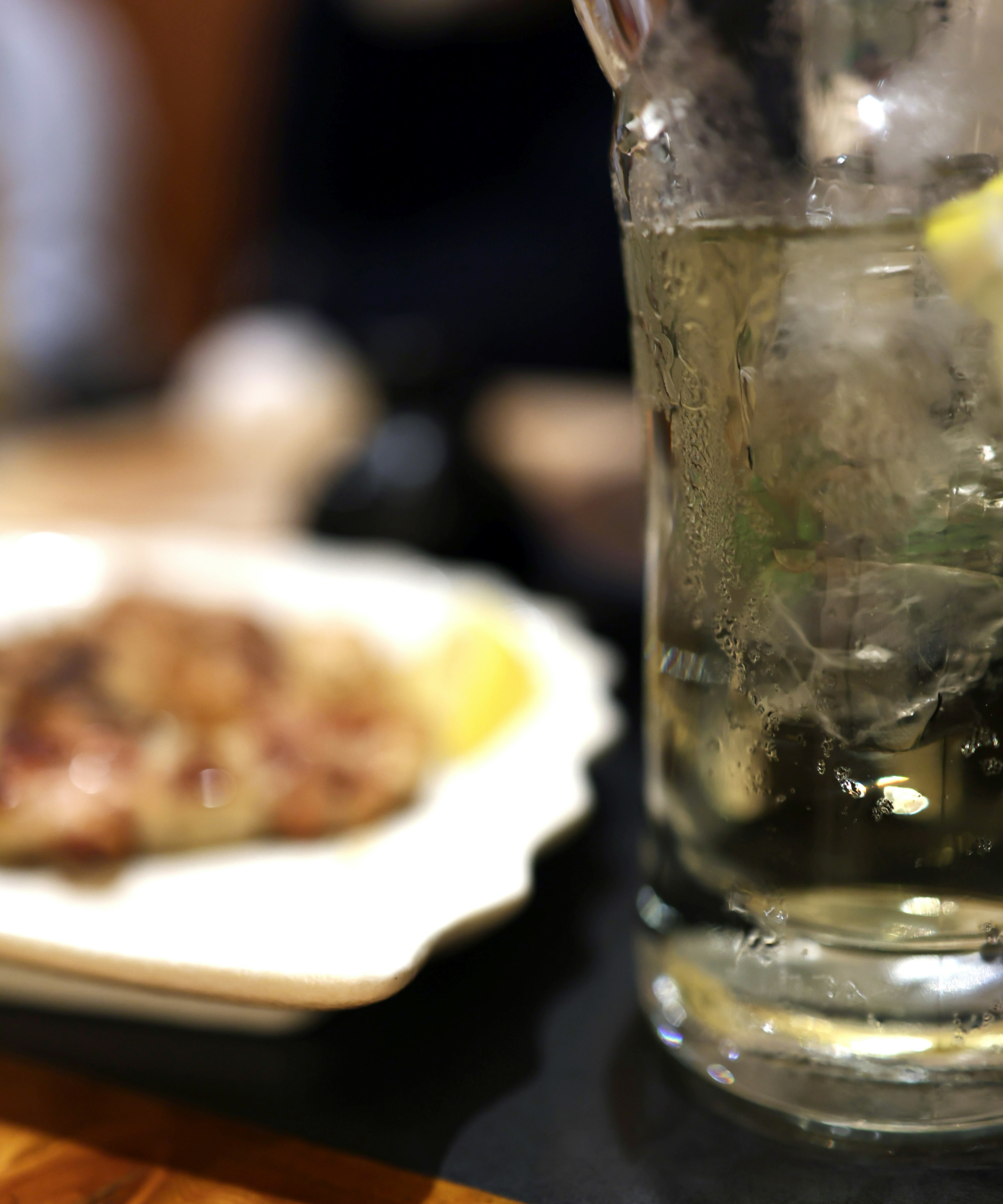 Close-up photo of a dish and drink on the table