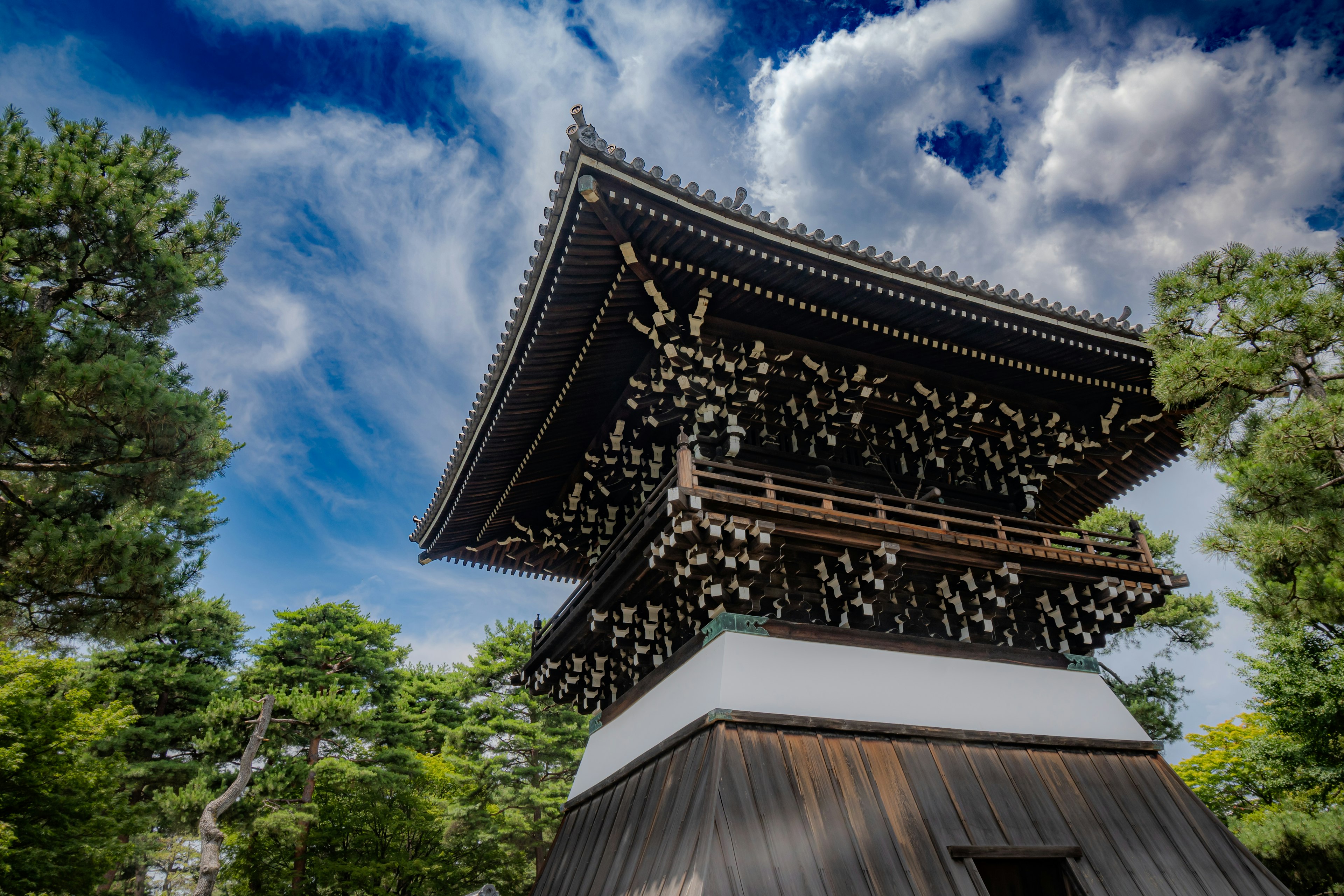 Beautiful wooden temple tower with a blue sky