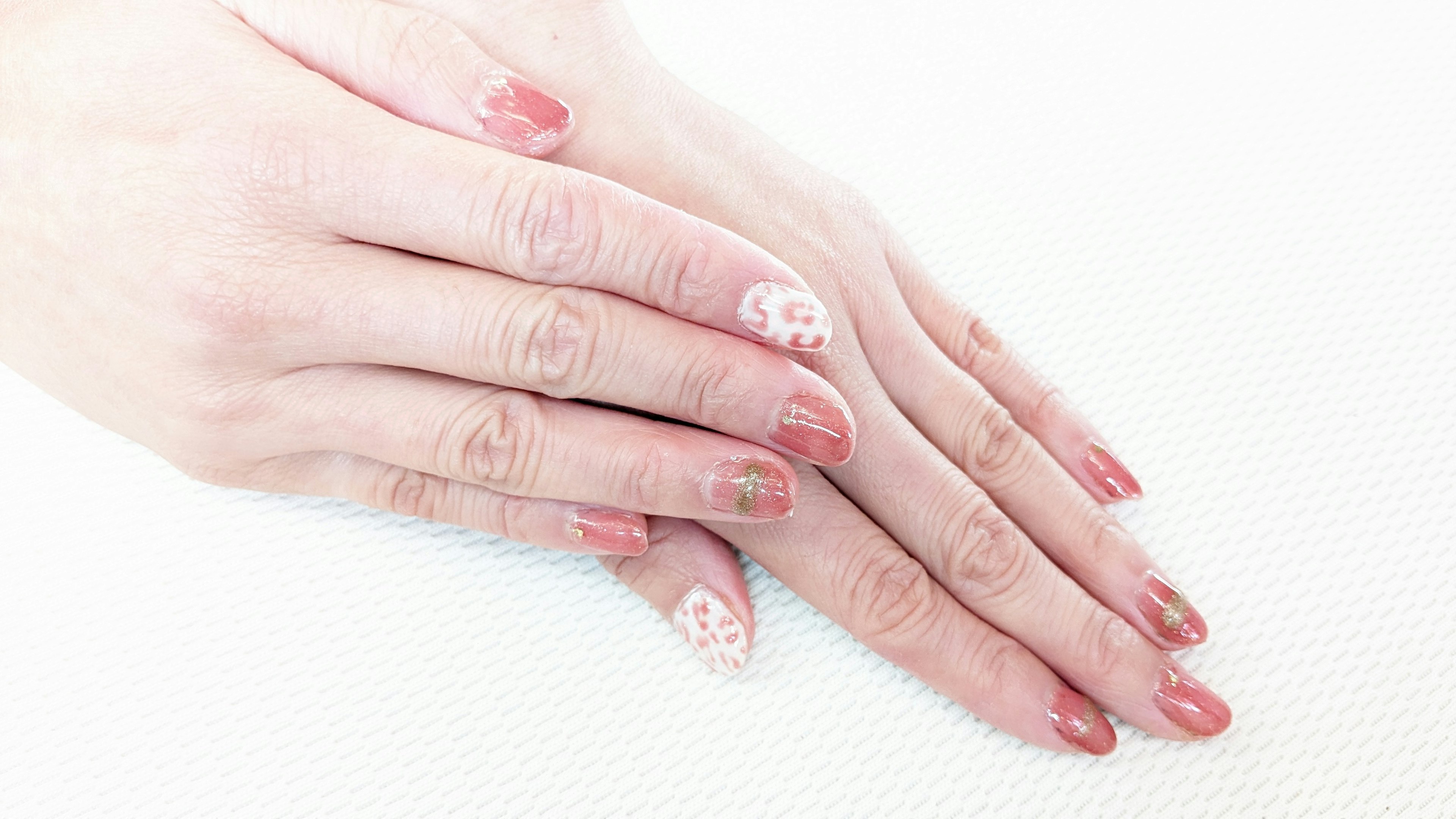 Beautifully designed nail art on hands