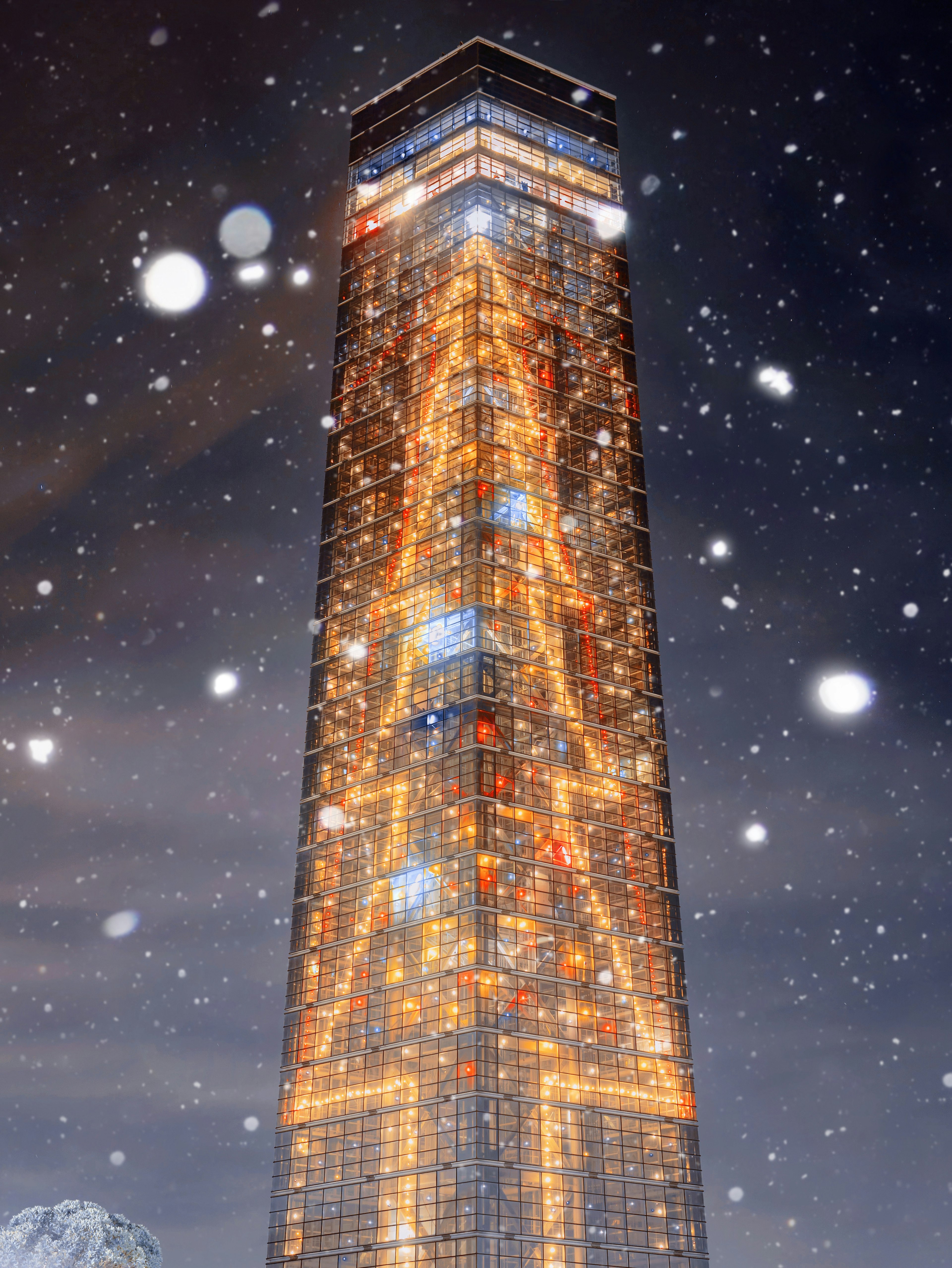 Ein beleuchteter Turm in Form des Eiffelturms umgeben von fallendem Schnee