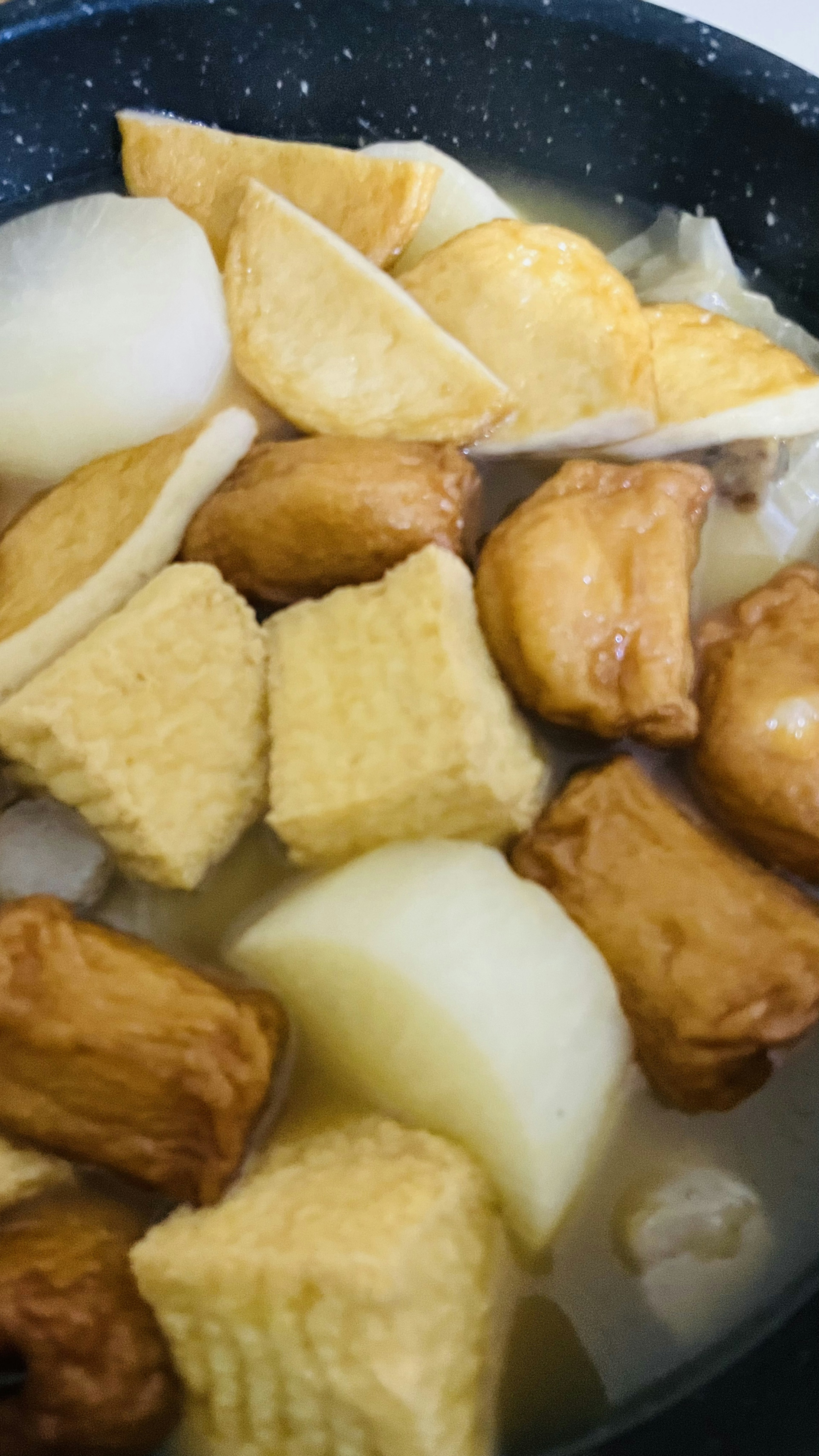 Oden ingredients and broth in a pot