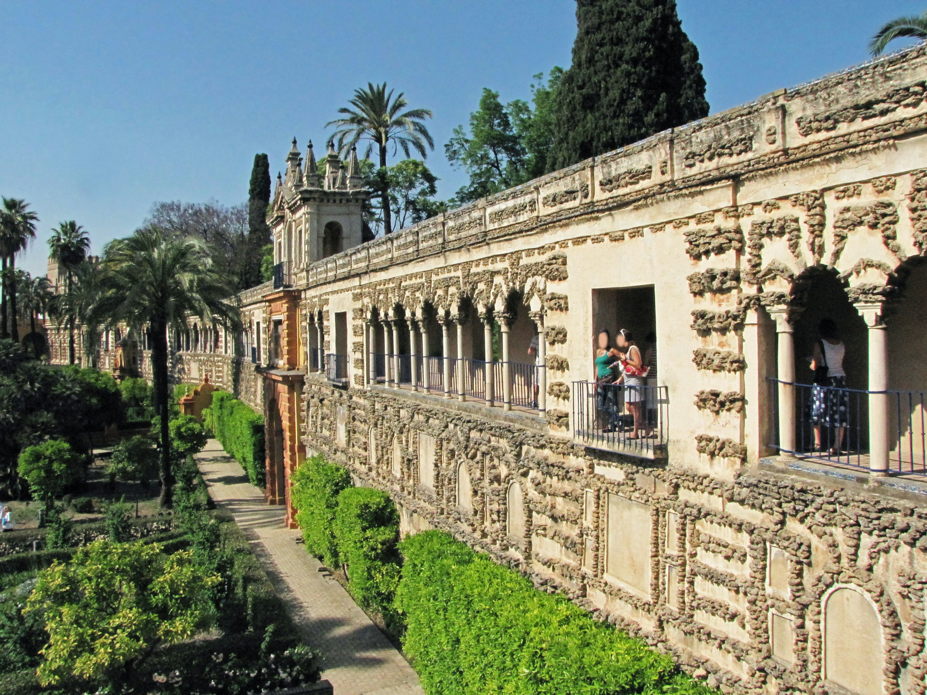 Historic building exterior with beautiful garden background