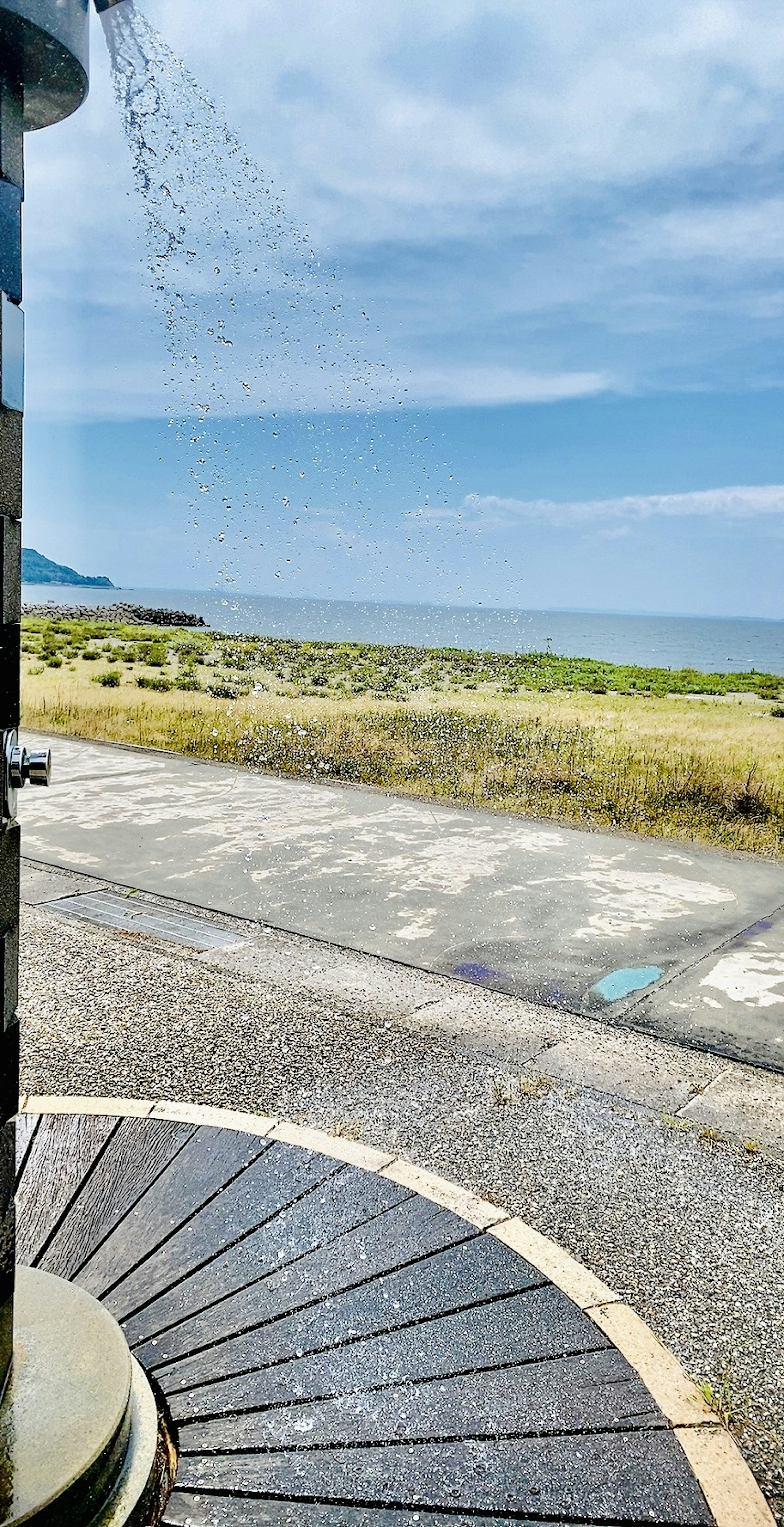 Shower facility with a view of the sea and blue sky