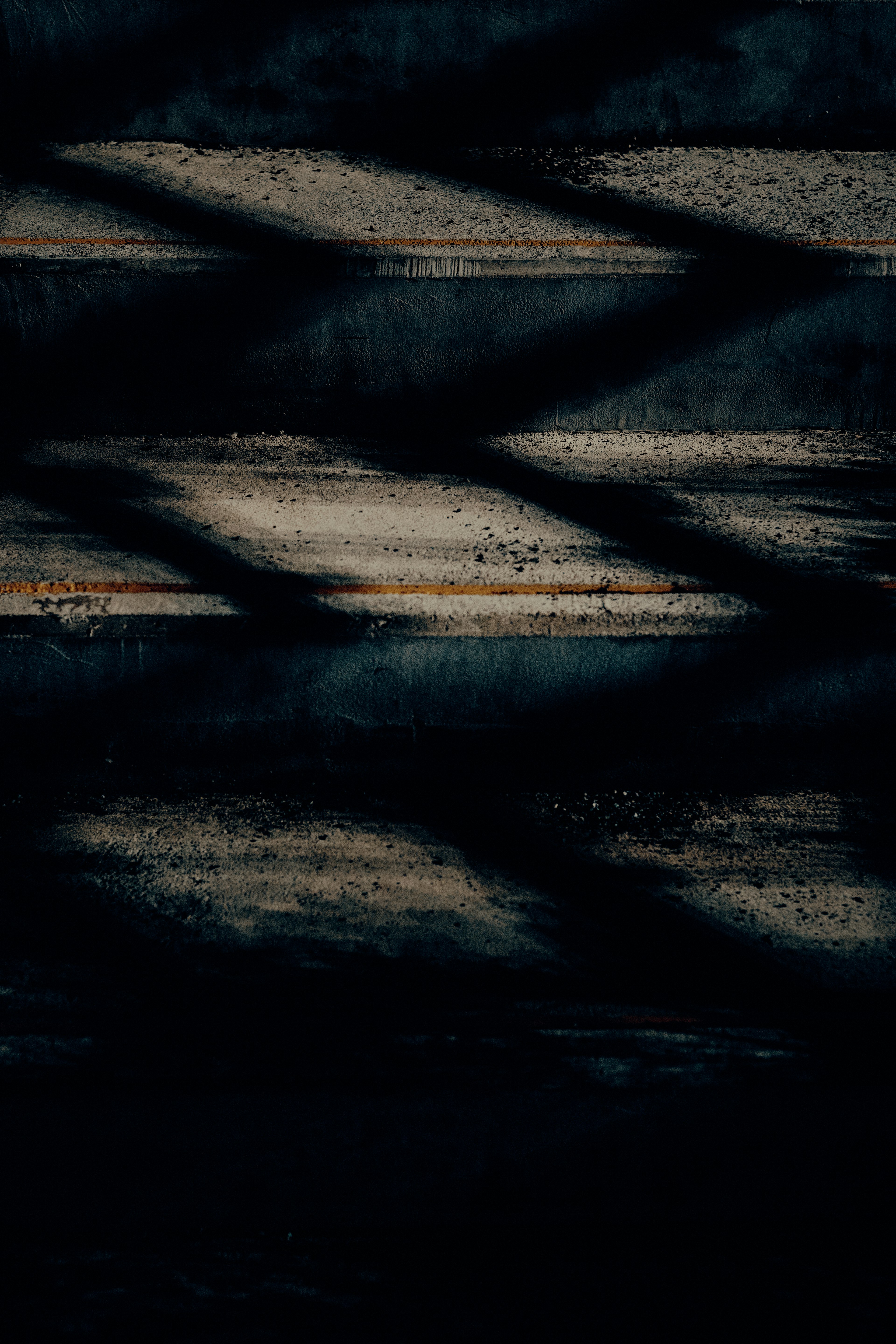 Texture with intersecting shadows on a dark background