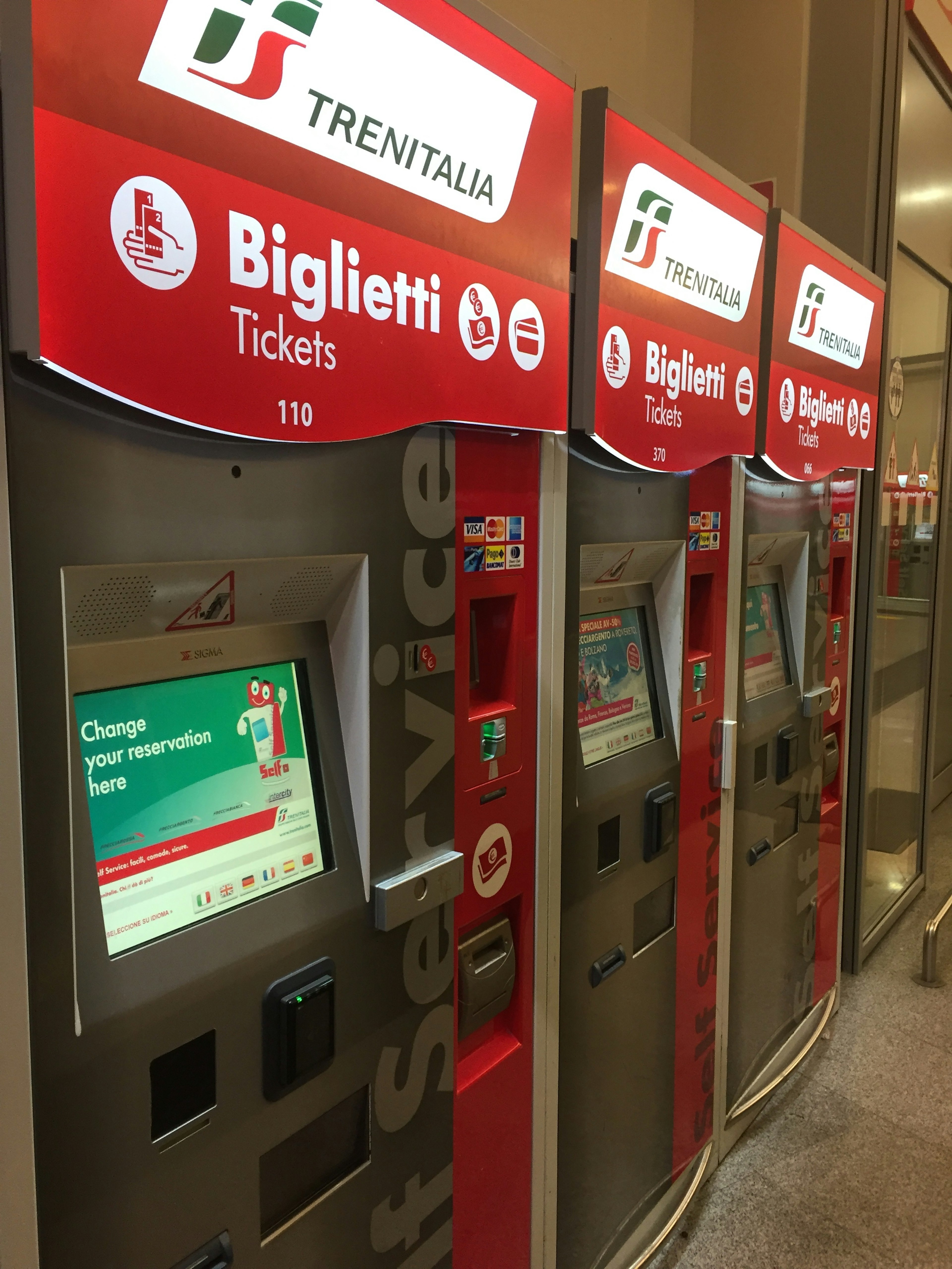 Trenitalia ticket vending machines in a train station