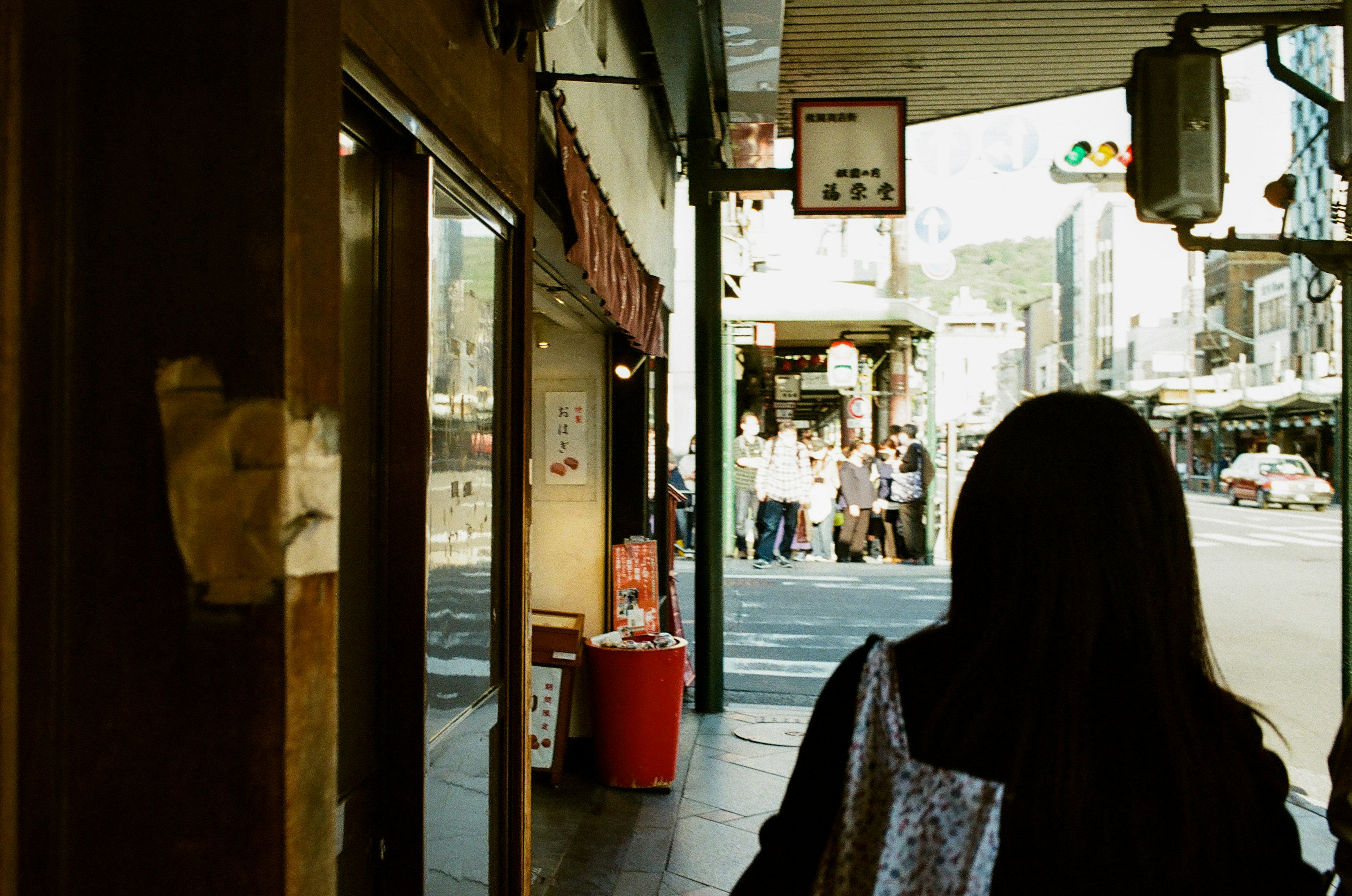 Street view with people crossing at an intersection