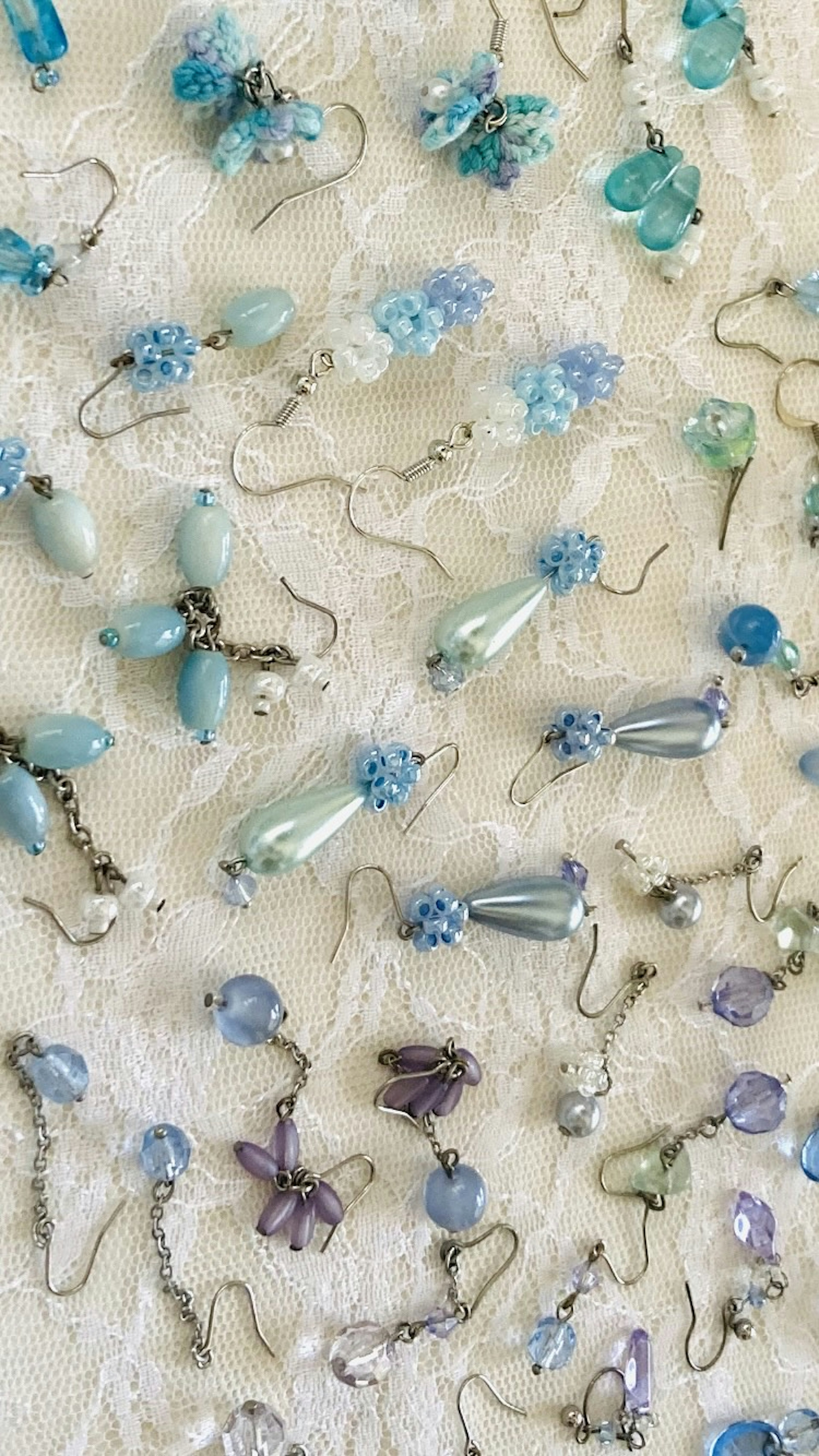 Collection of earrings made with various blue beads