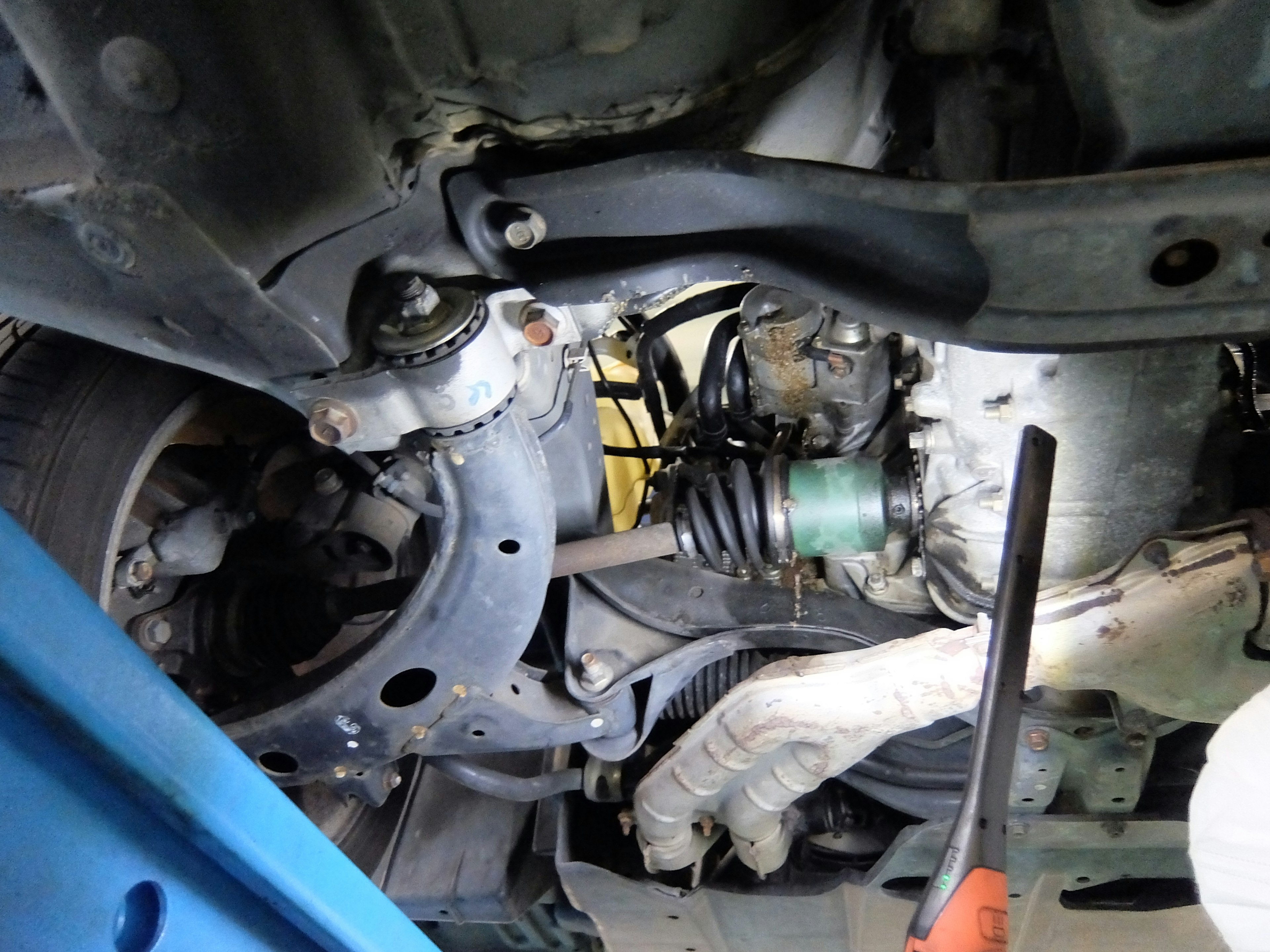 Detailed view of a vehicle's suspension system underneath