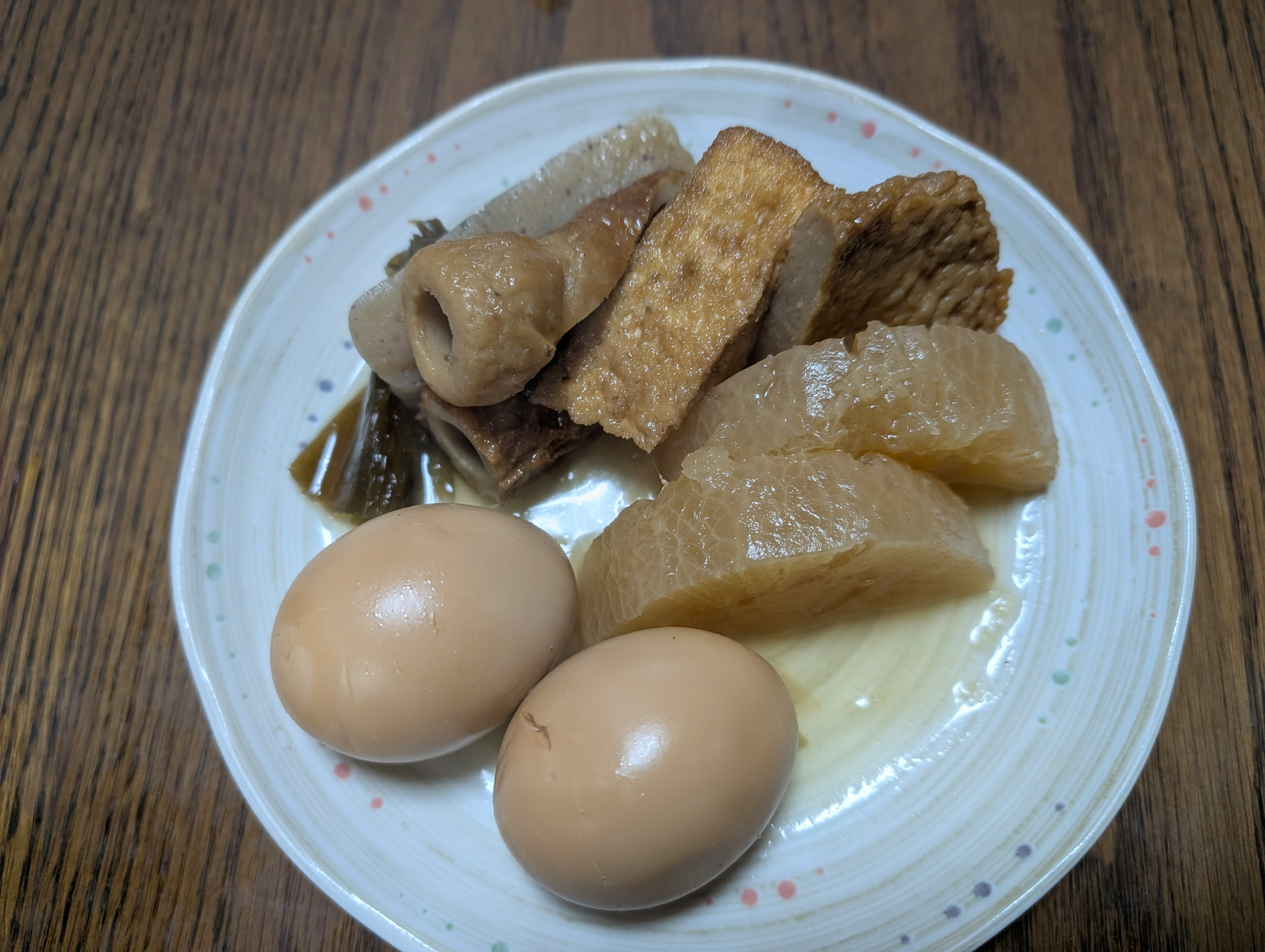 A plate of boiled eggs and cooked root vegetables