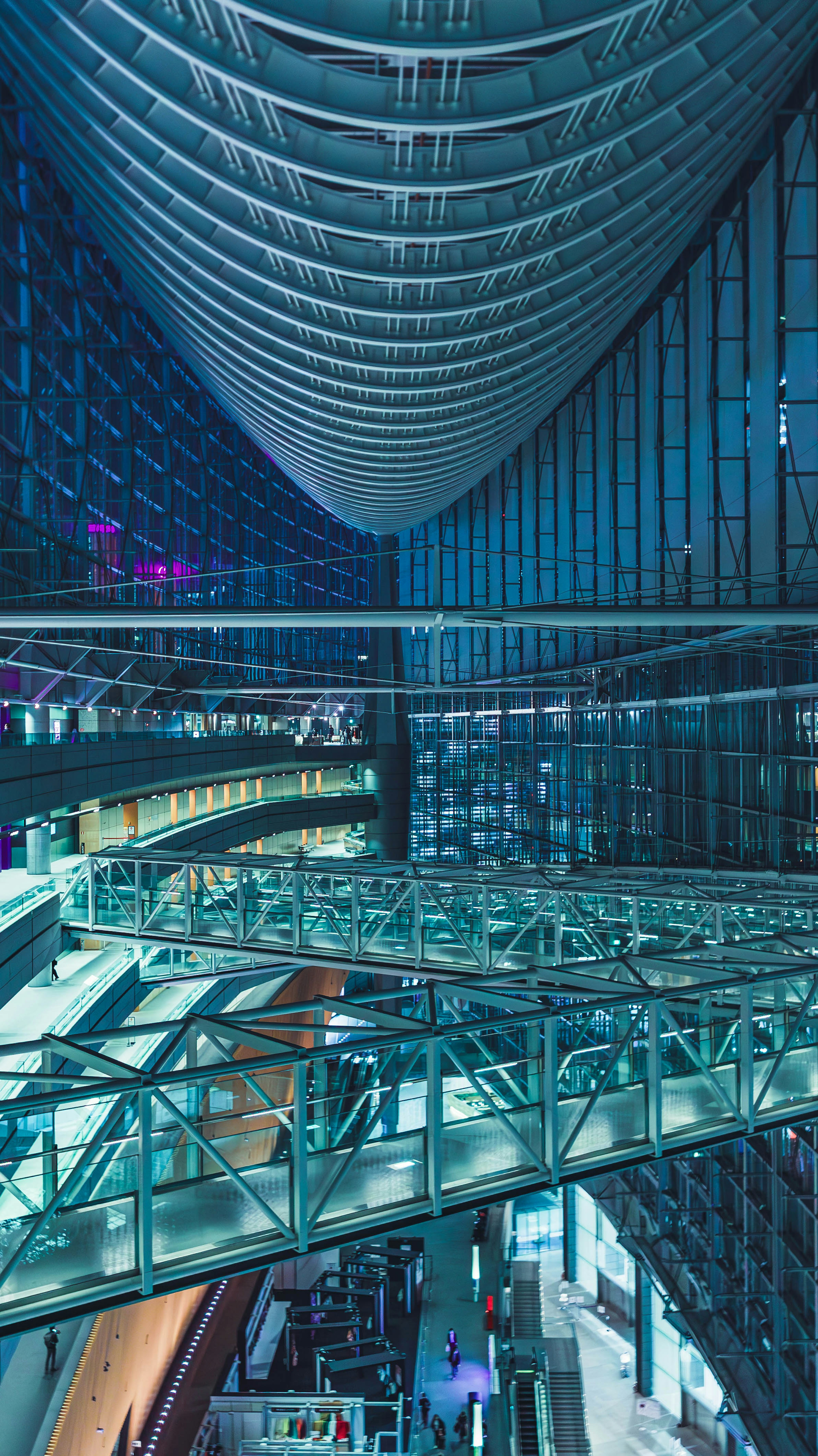 Modern architectural interior featuring blue and purple lighting