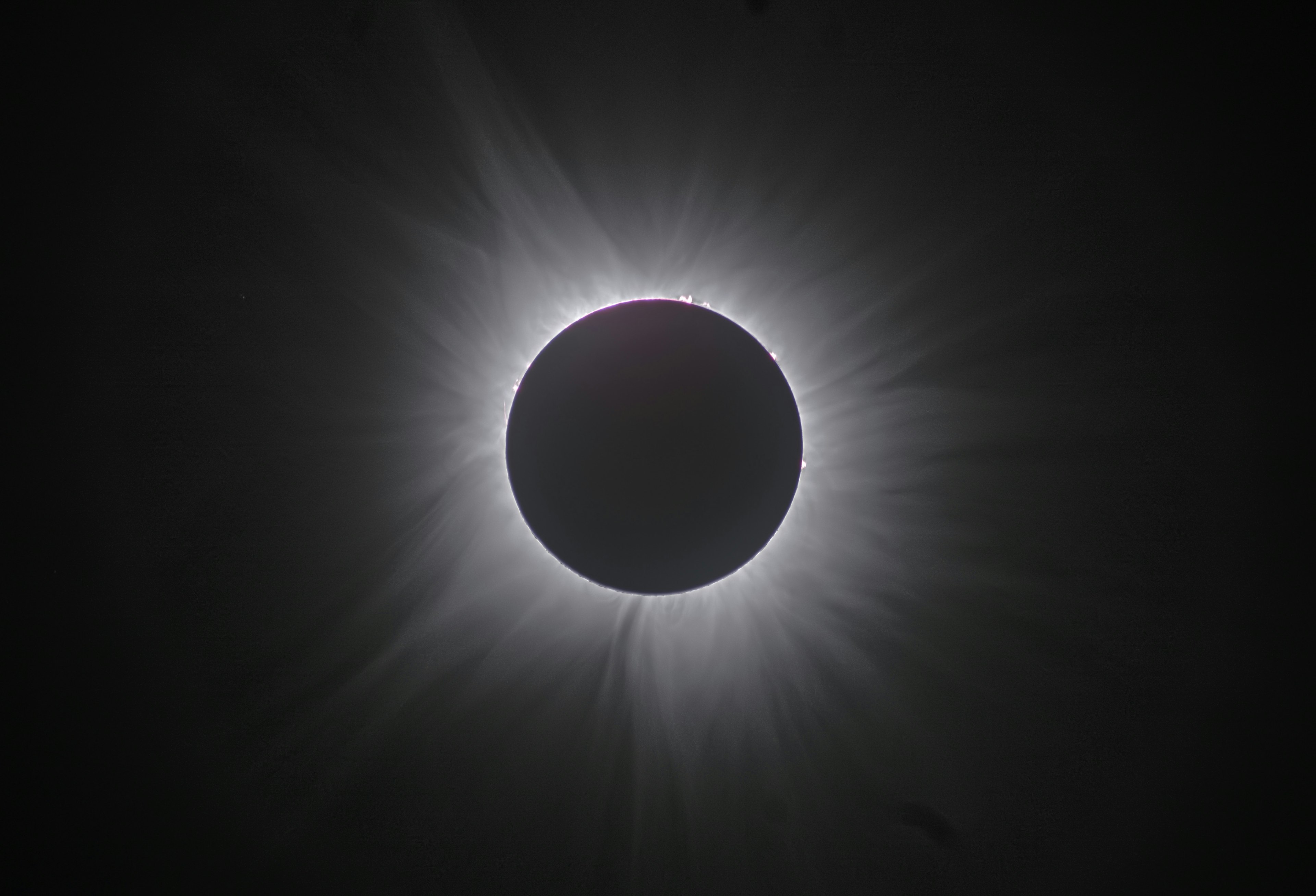 Photo of a solar eclipse with the corona visible around the sun