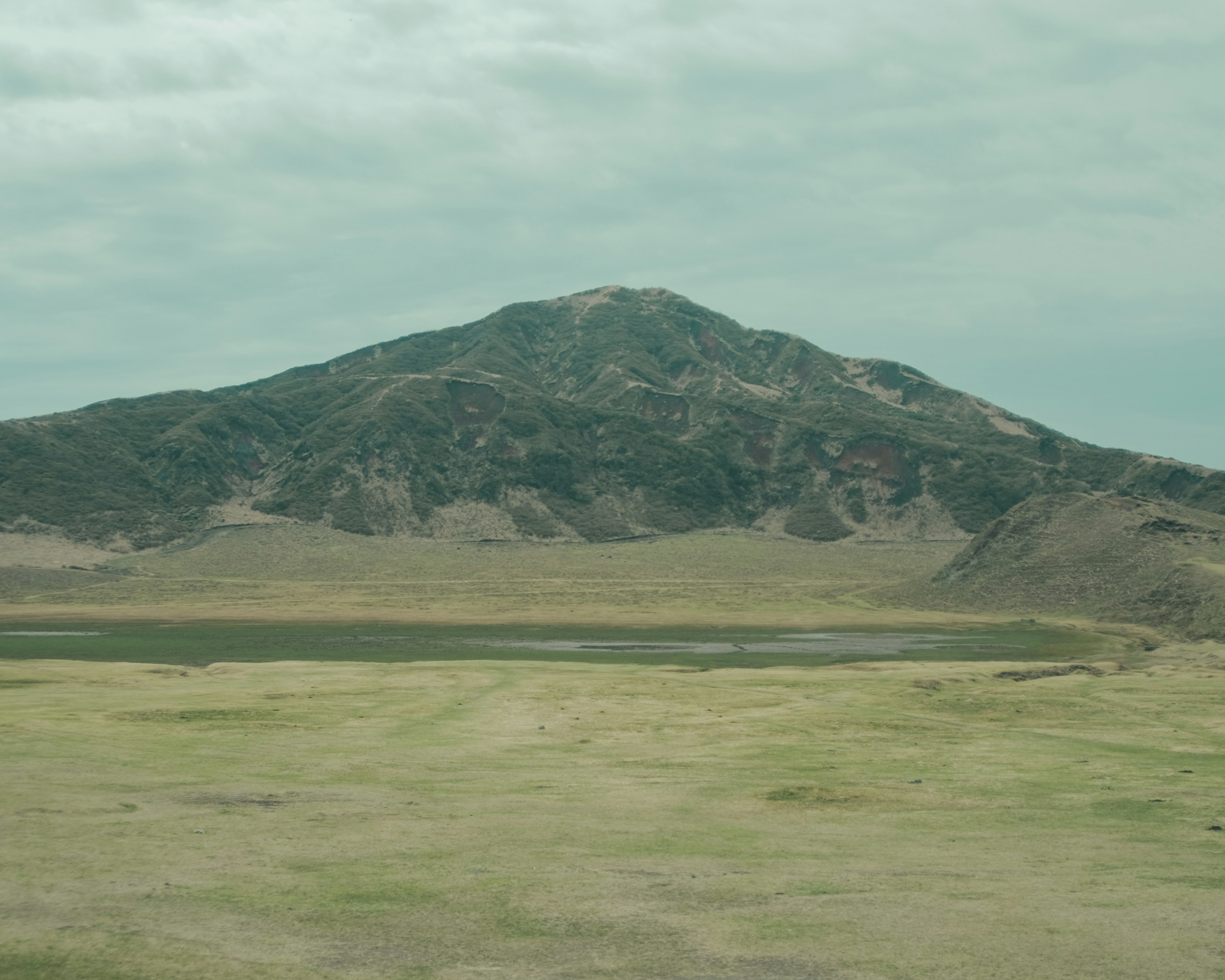 Mountain landscape with expansive grassland