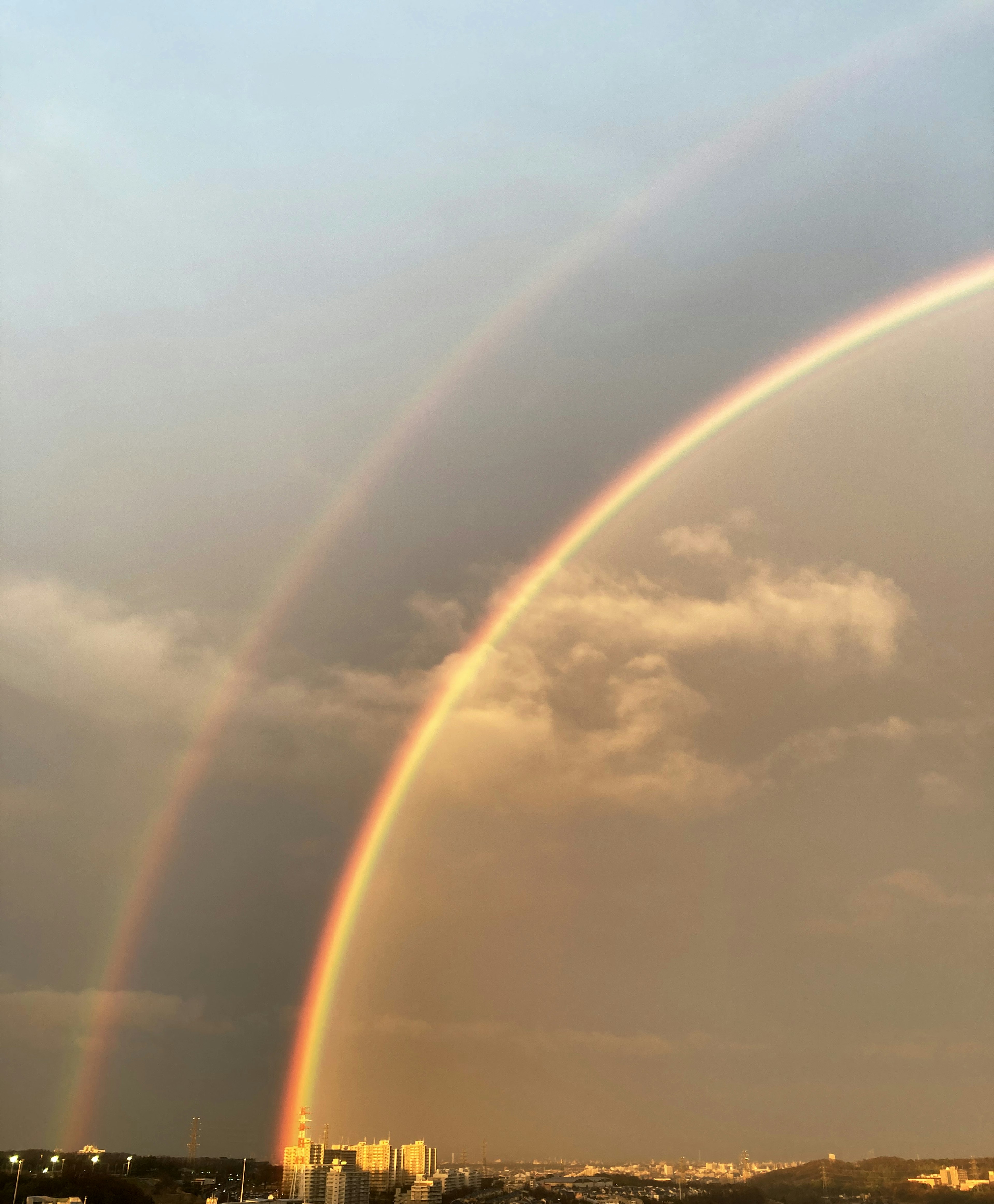 A beautiful double rainbow arching across the sky