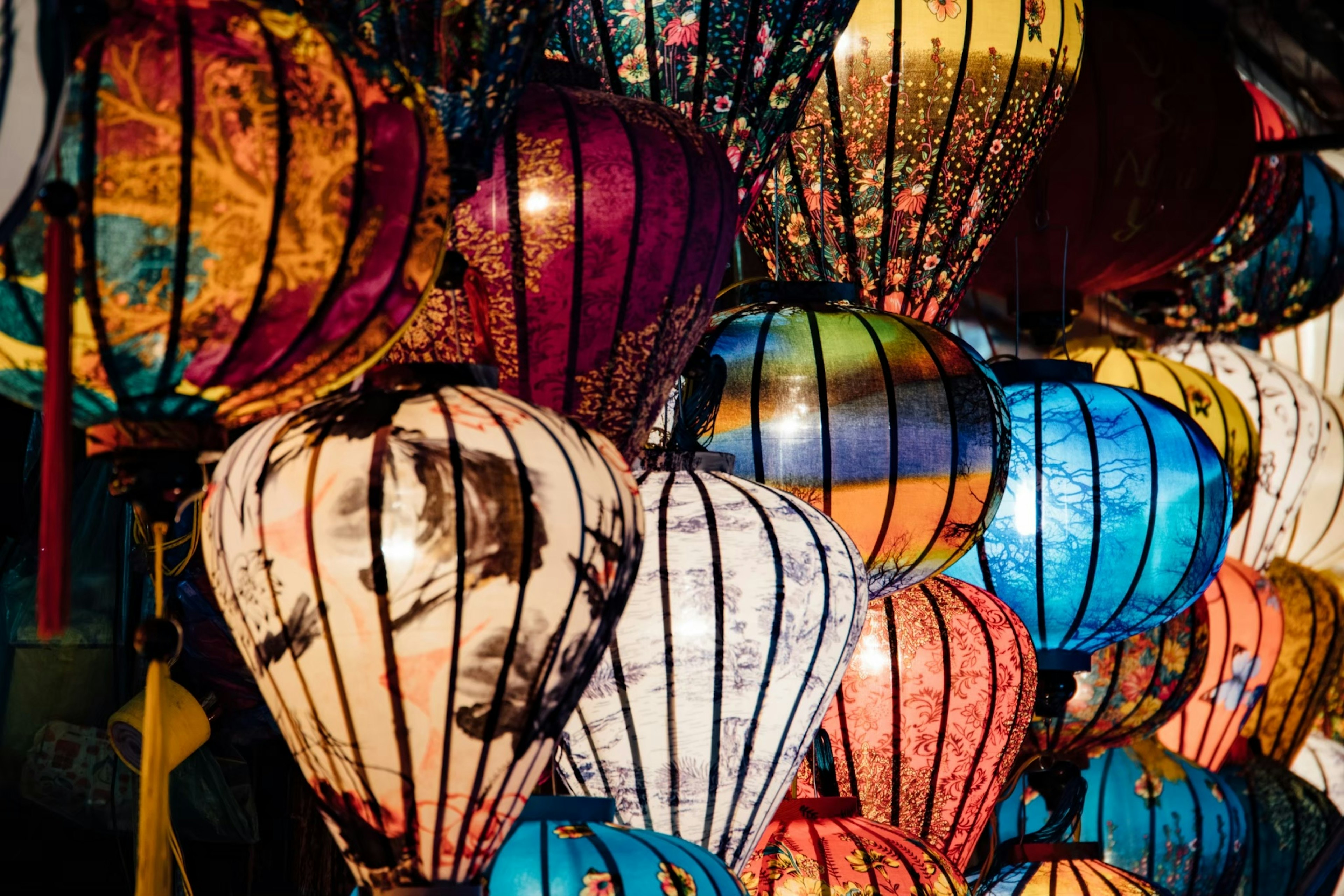 A vibrant display of colorful lanterns showcasing intricate designs and patterns