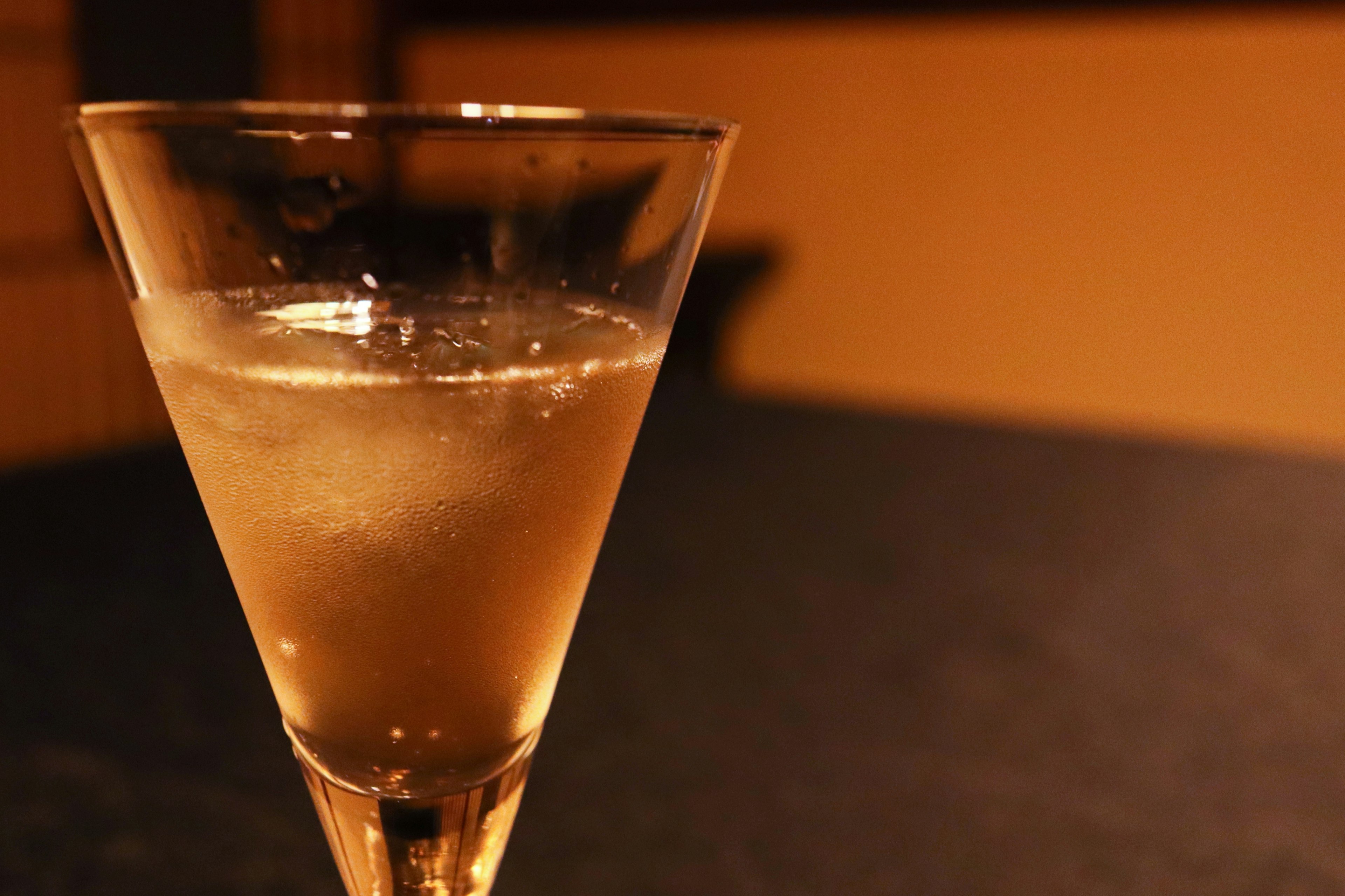 Close-up of a sparkling drink in a clear cocktail glass