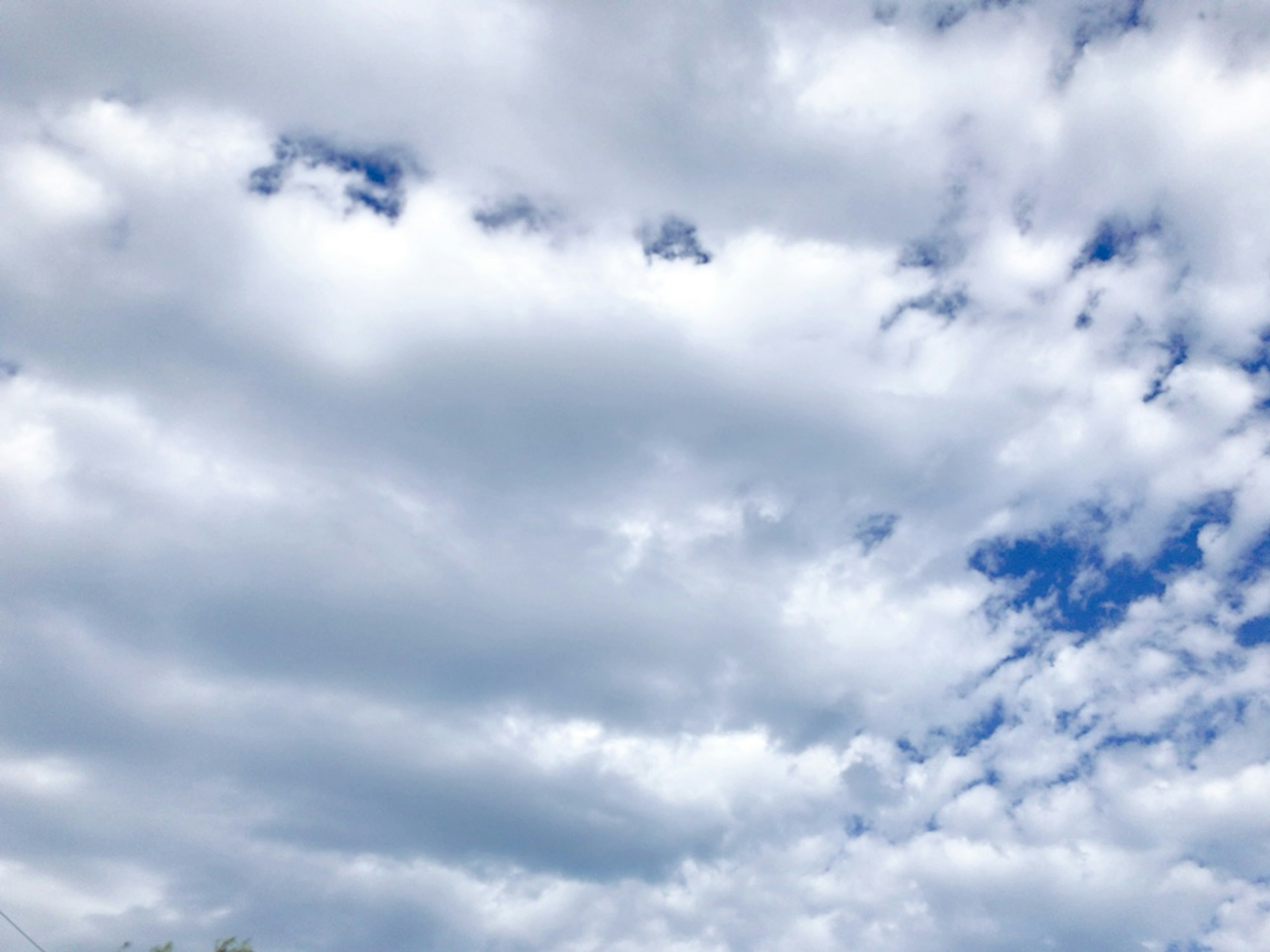 A landscape featuring blue sky and white clouds