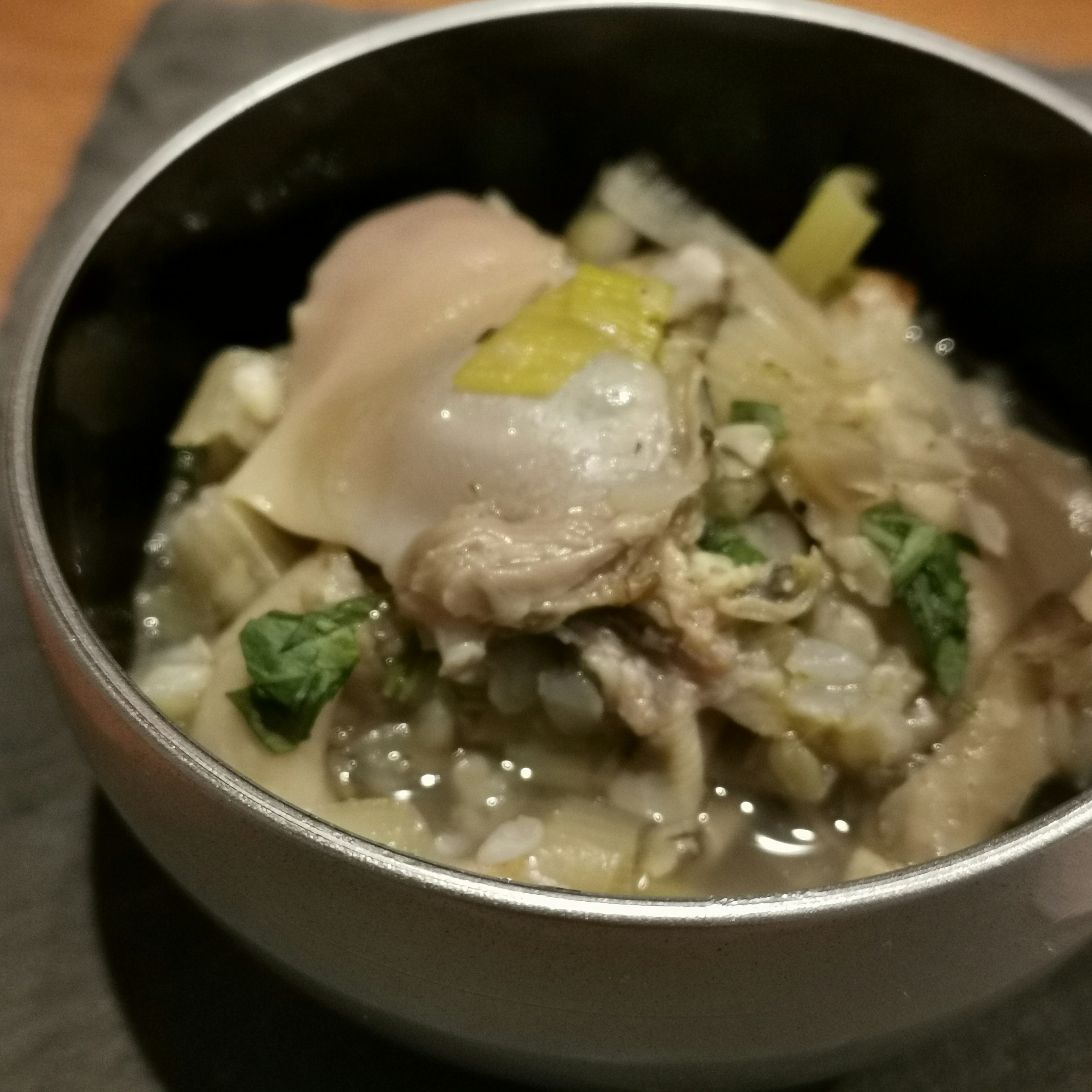 Bowl of delicious soup with various ingredients