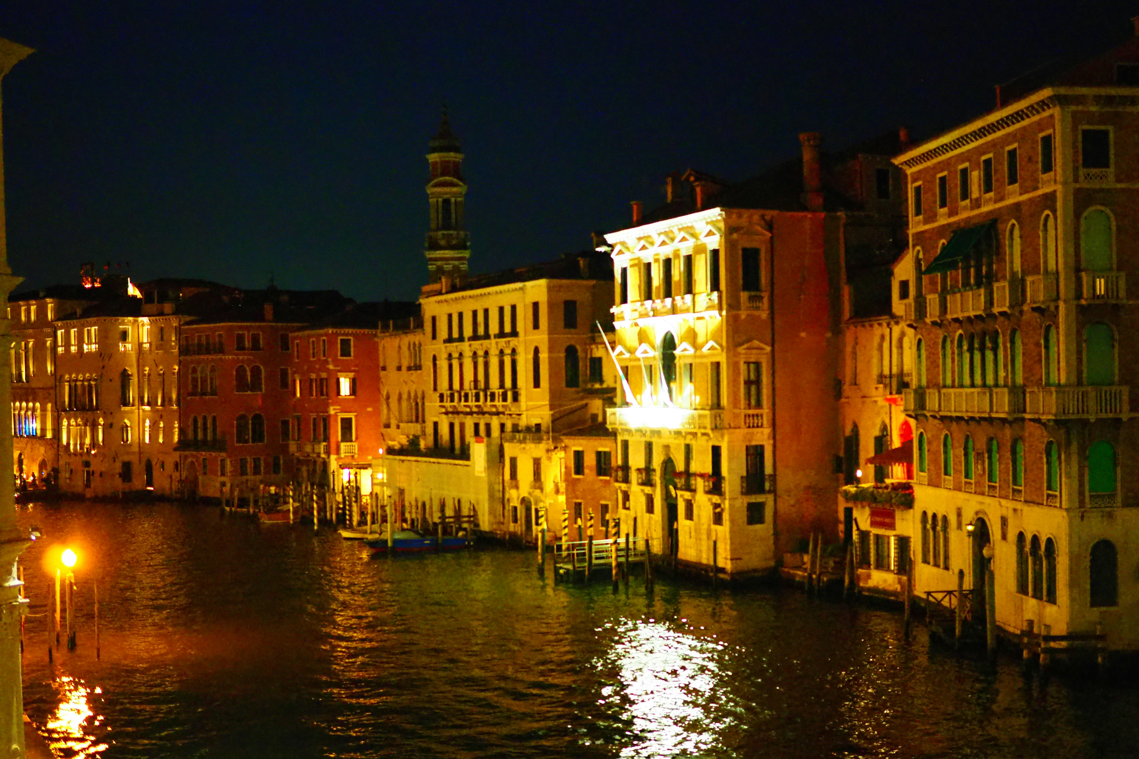 Beautiful buildings along the canal in Venice at night