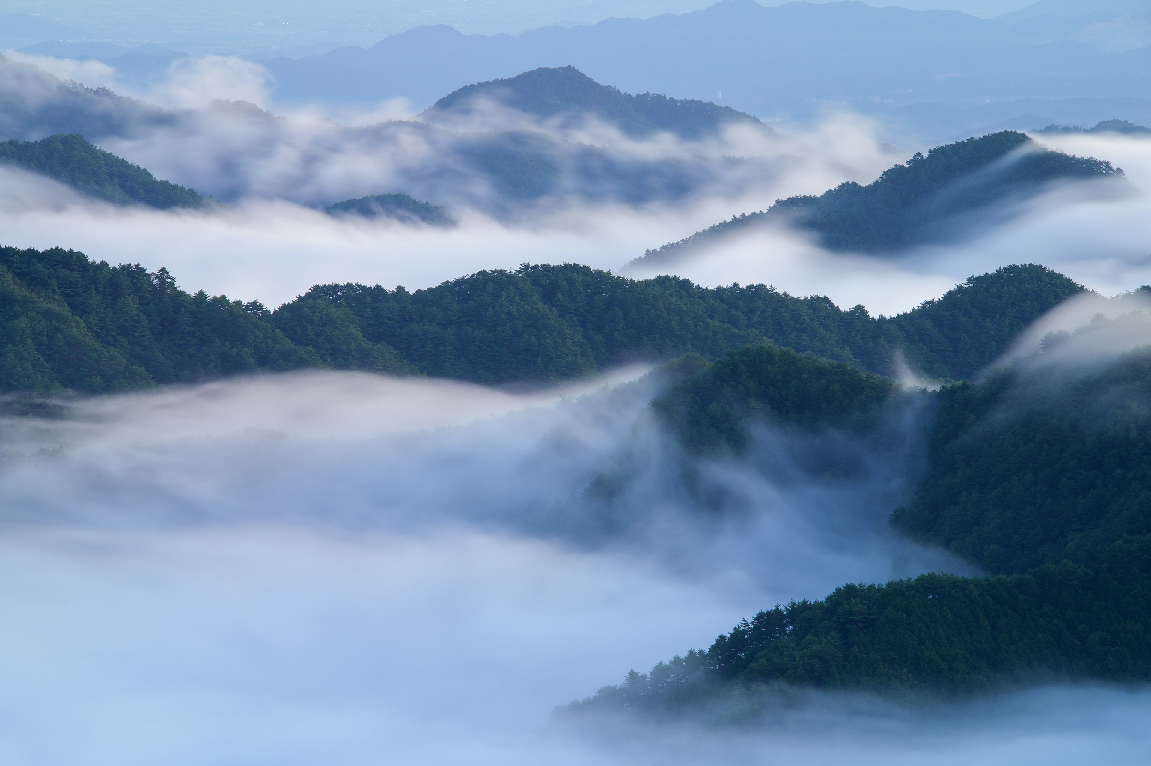 A beautiful mountain landscape shrouded in mist