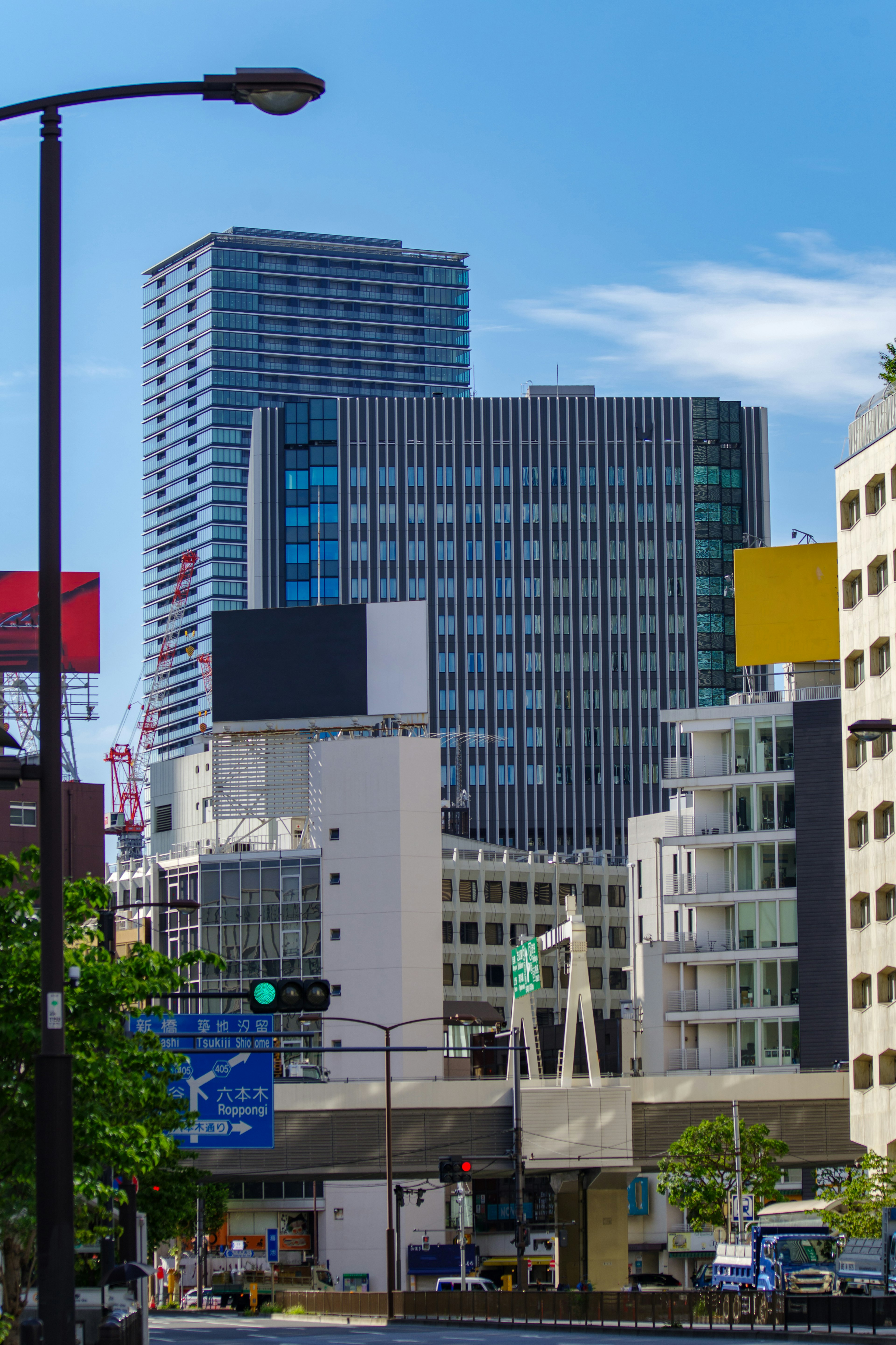 Urban skyline featuring high-rise buildings and blue sky