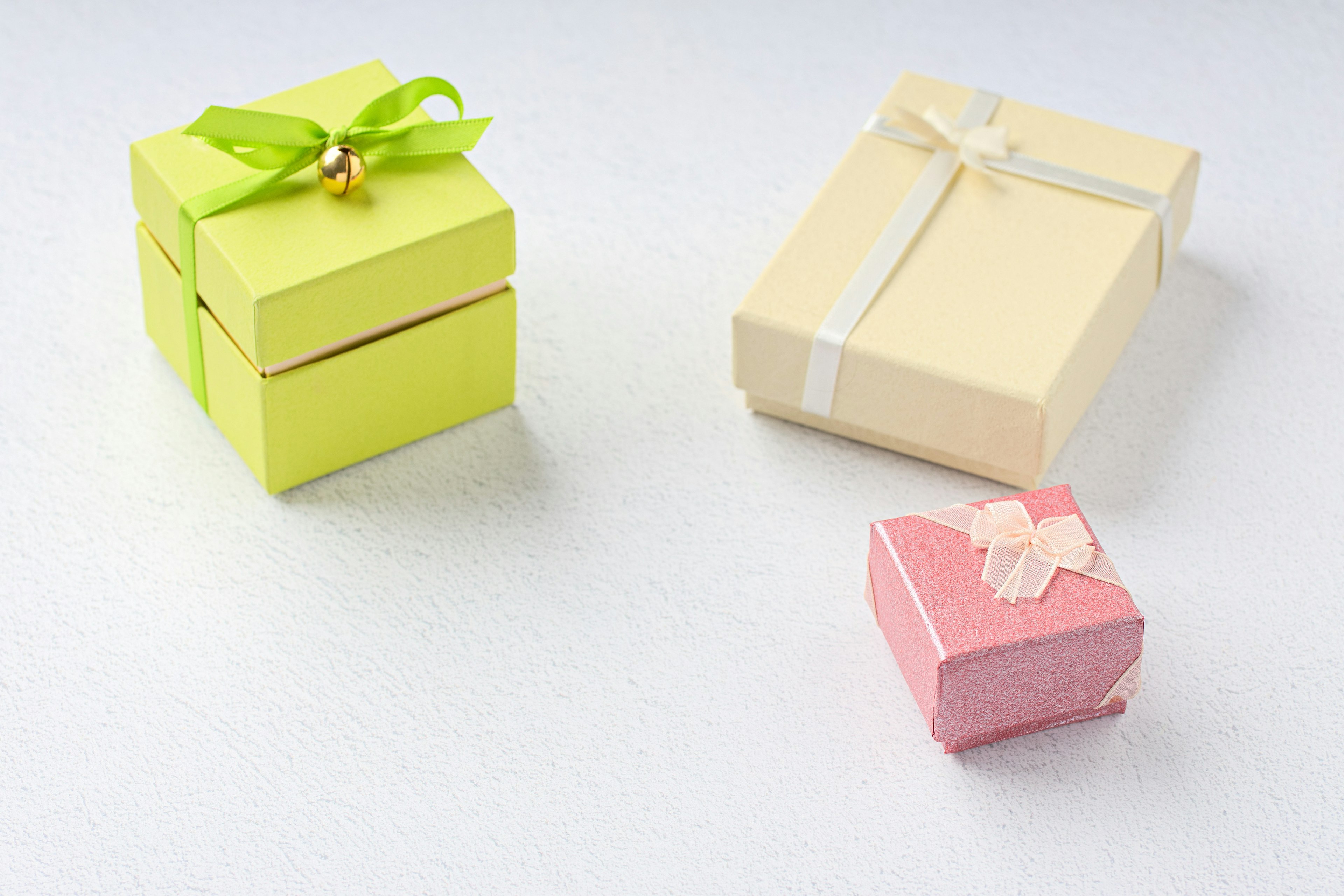 Colorful gift boxes arranged on a white background