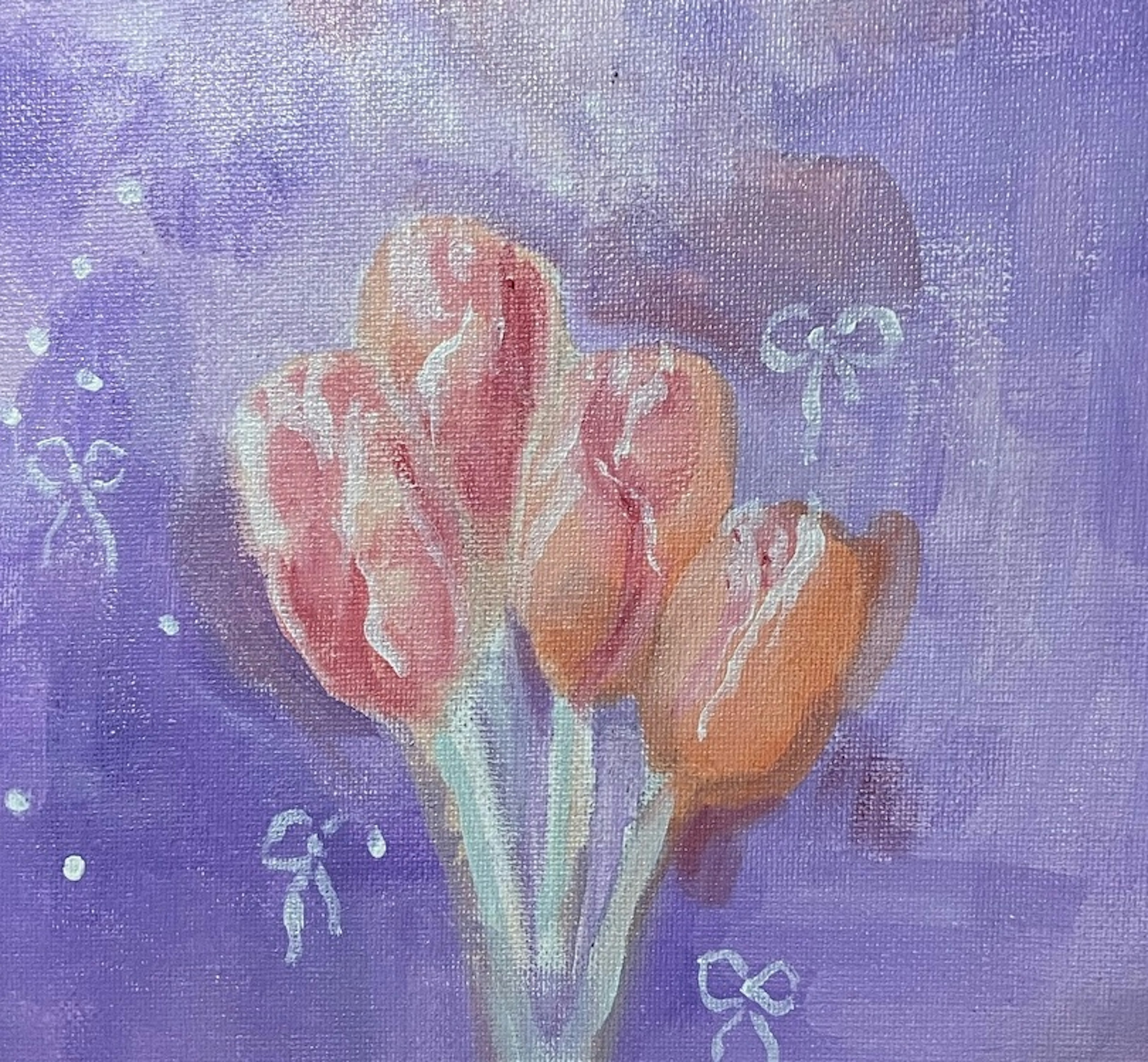 A bouquet of orange tulips against a purple background