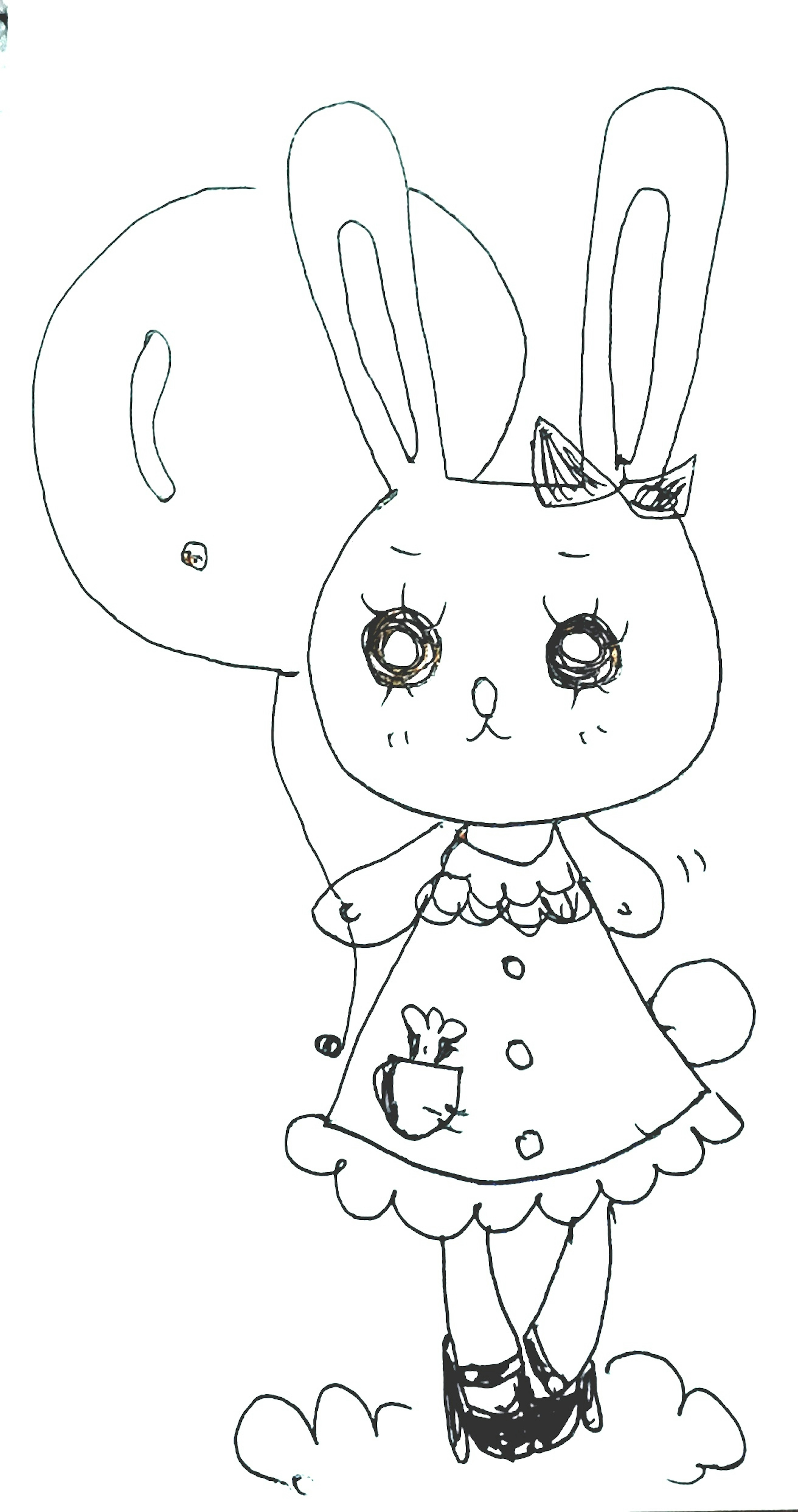 Un personnage de lapin mignon tenant un ballon