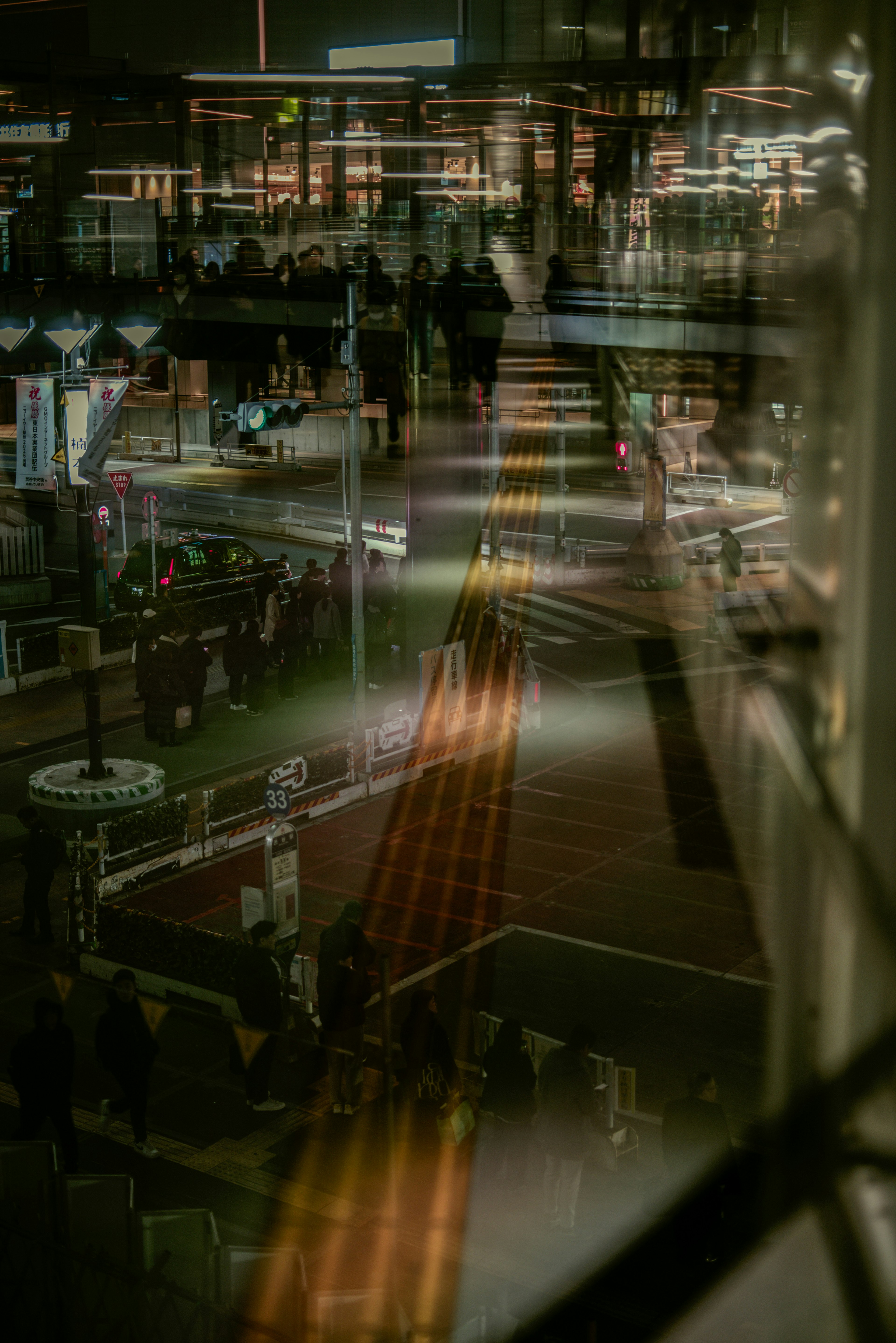 Night cityscape with reflections of lights