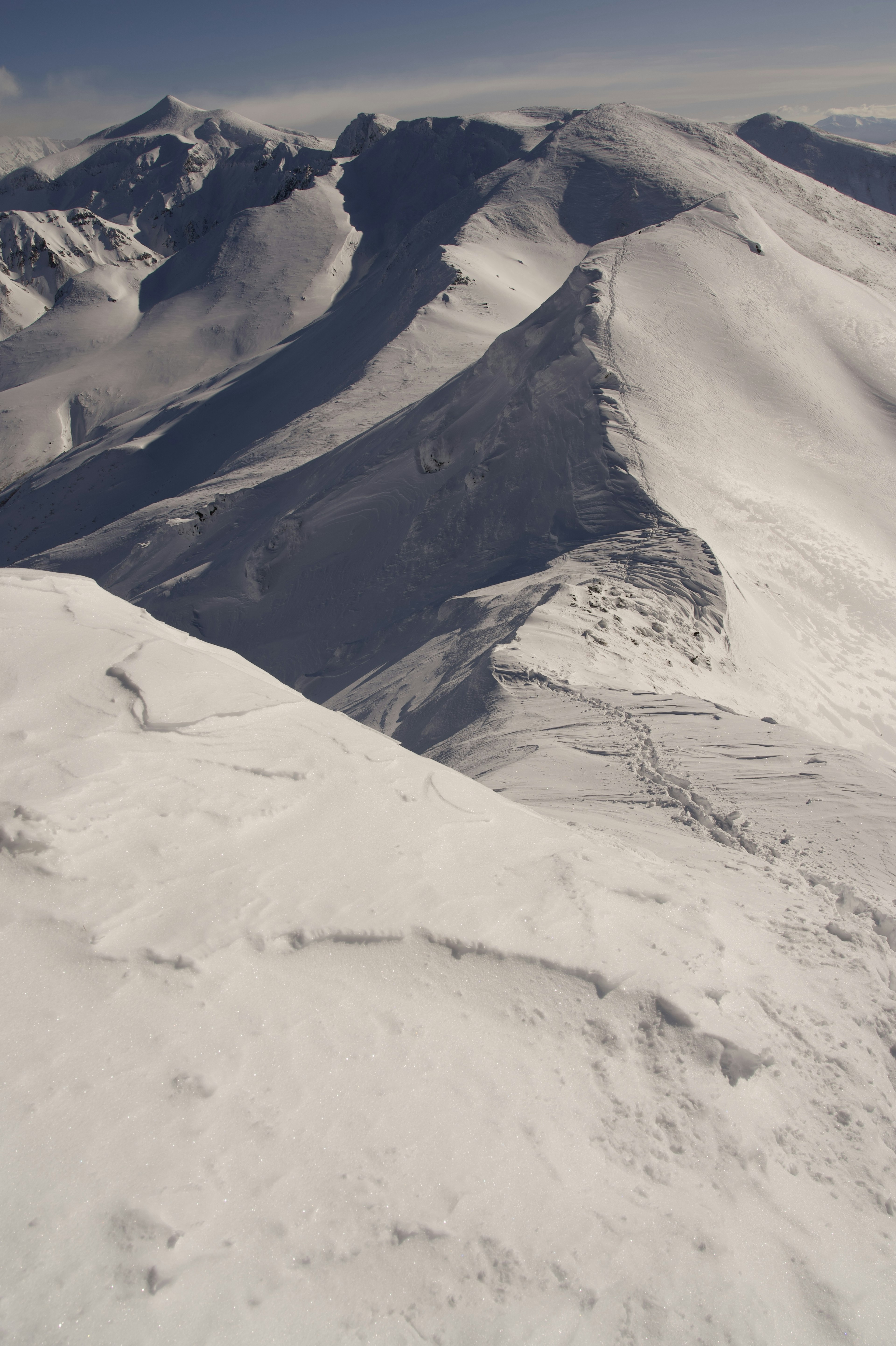 Snow-covered mountains and valleys landscape