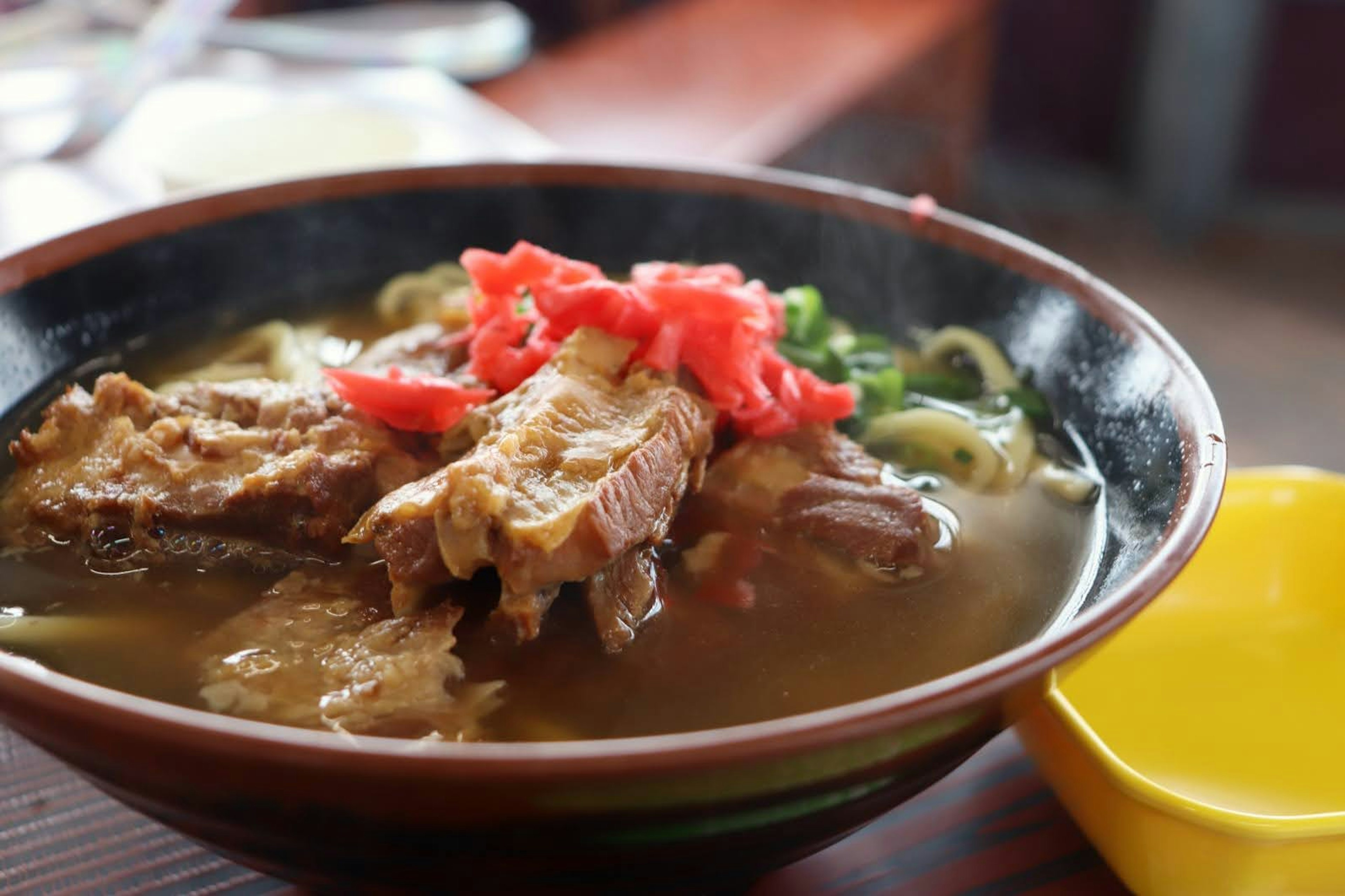 Delicious bowl of ramen with meat and toppings