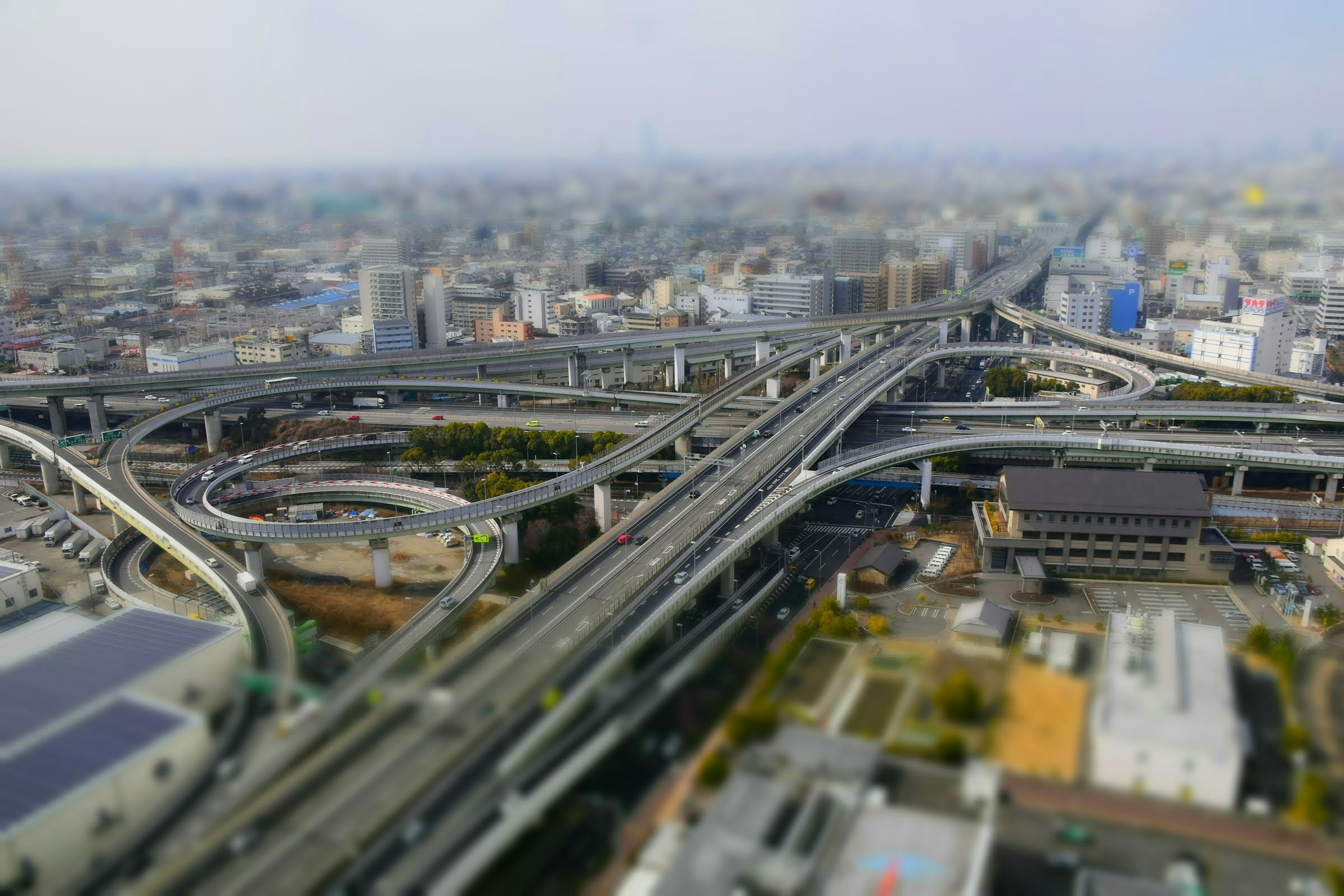 Aerial view of a highway interchange Urban landscape with overpasses and buildings