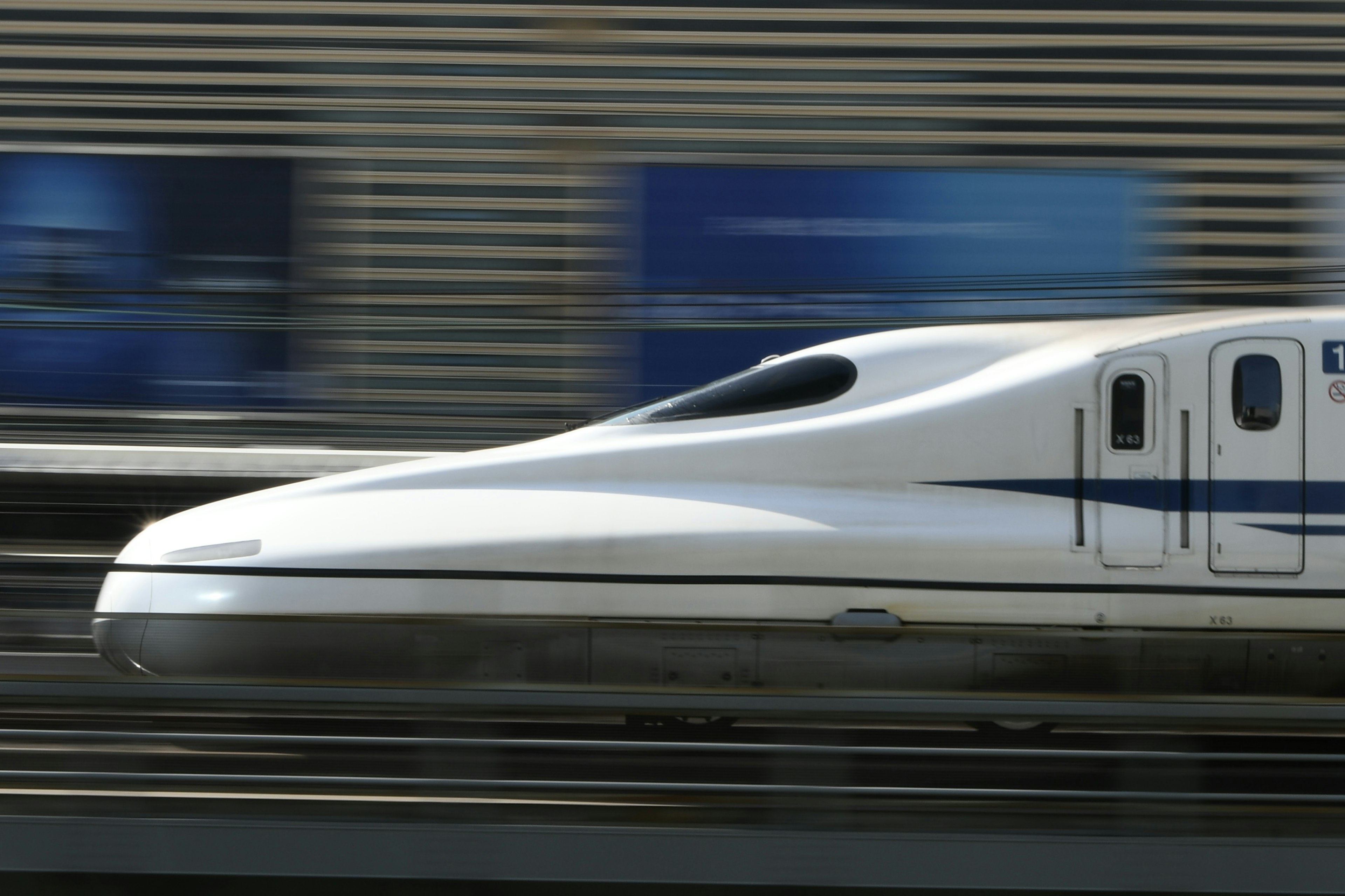 Shinkansen train with a streamlined design moving at high speed