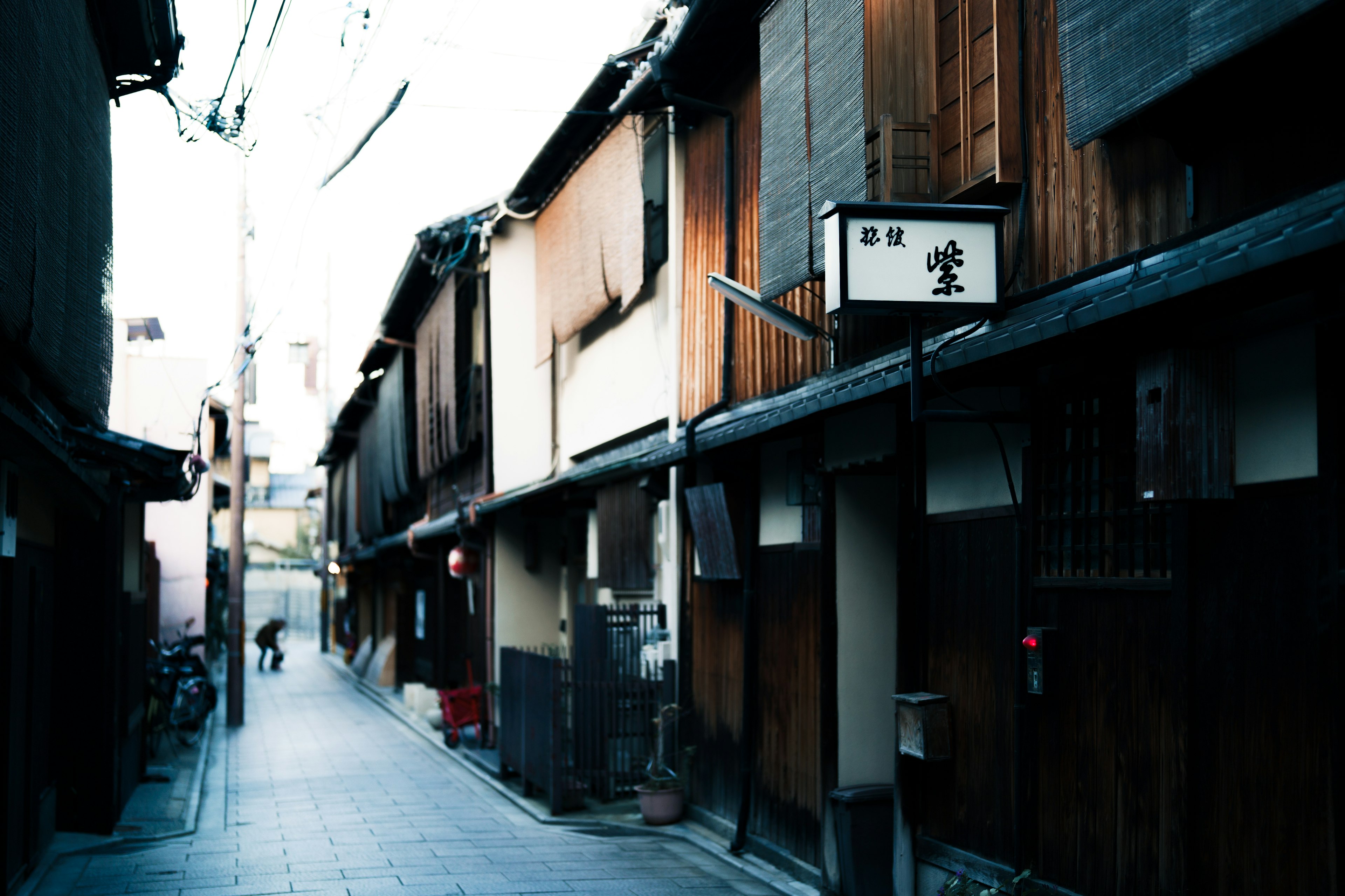 Quiet alley lined with traditional wooden buildings