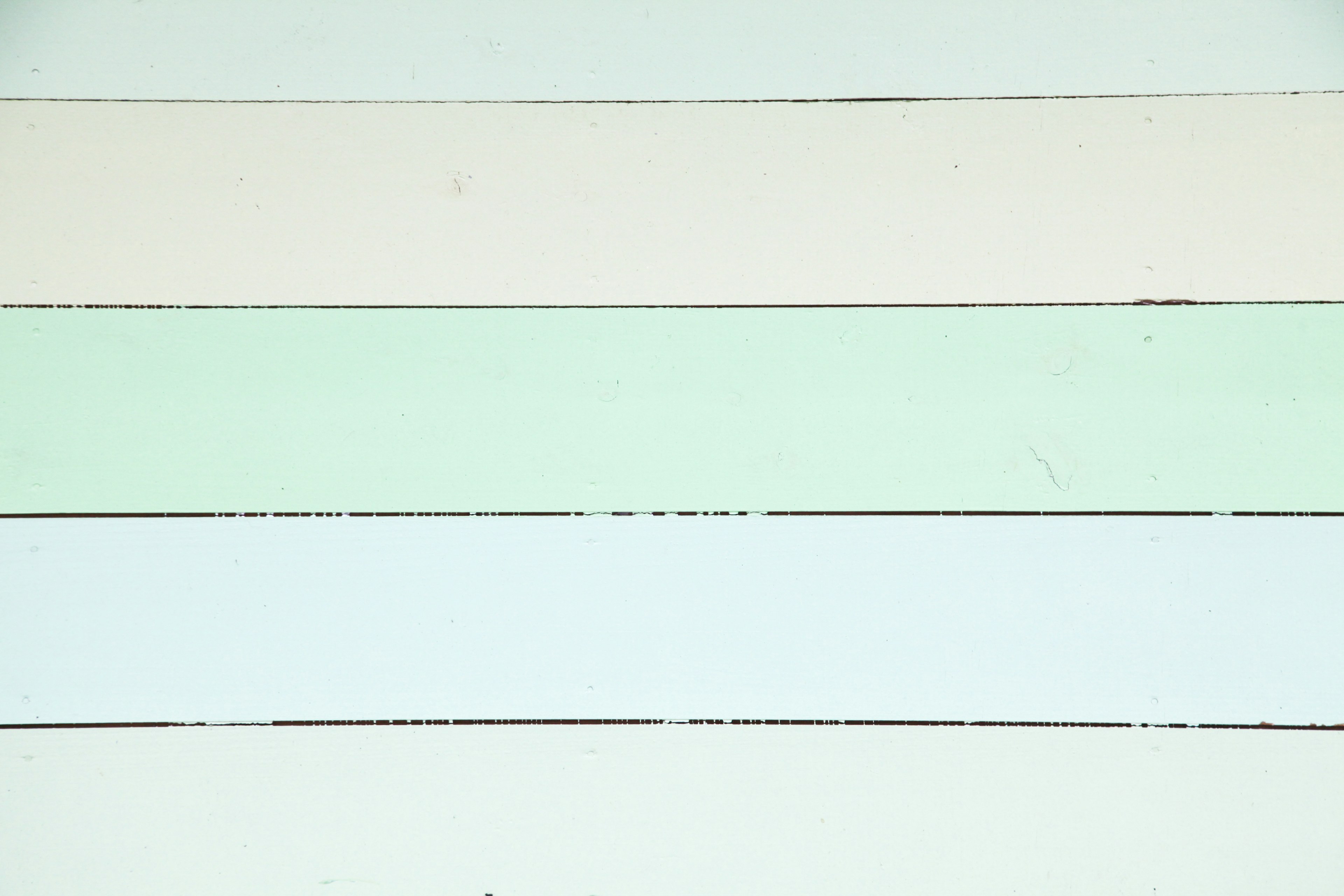 Pale color paint samples arranged horizontally