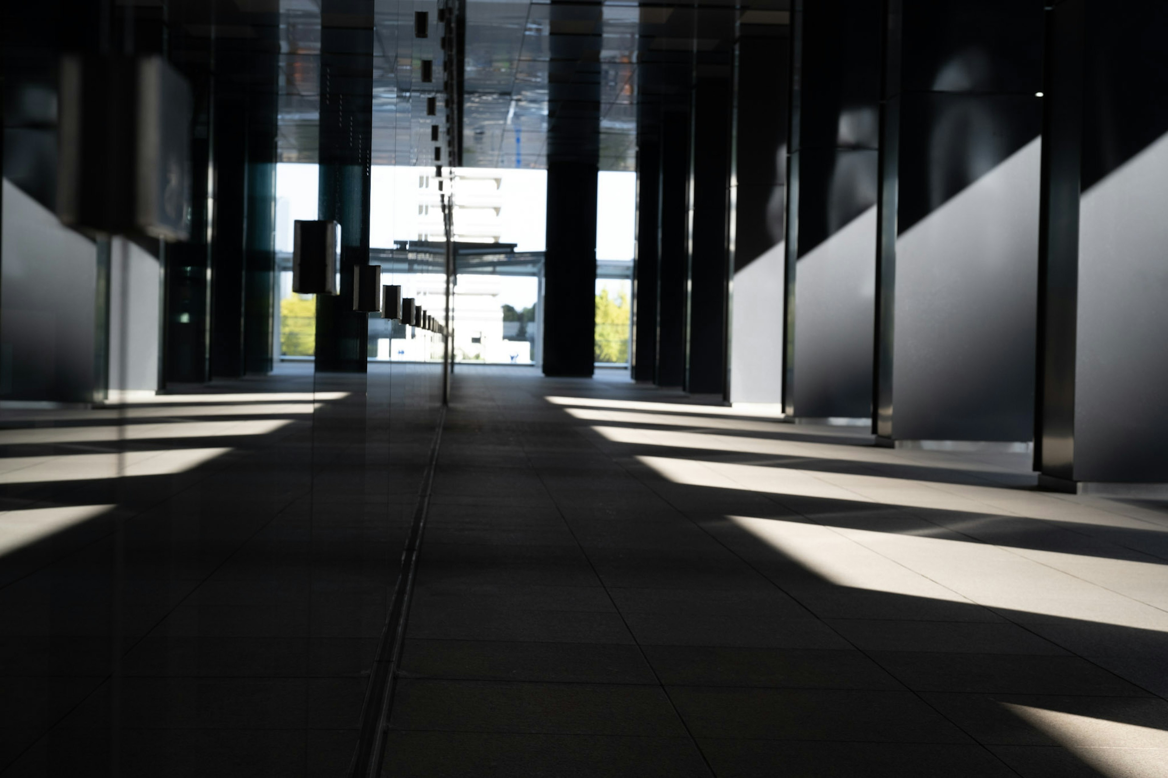 Modern interior corridor with striking light and shadow contrasts