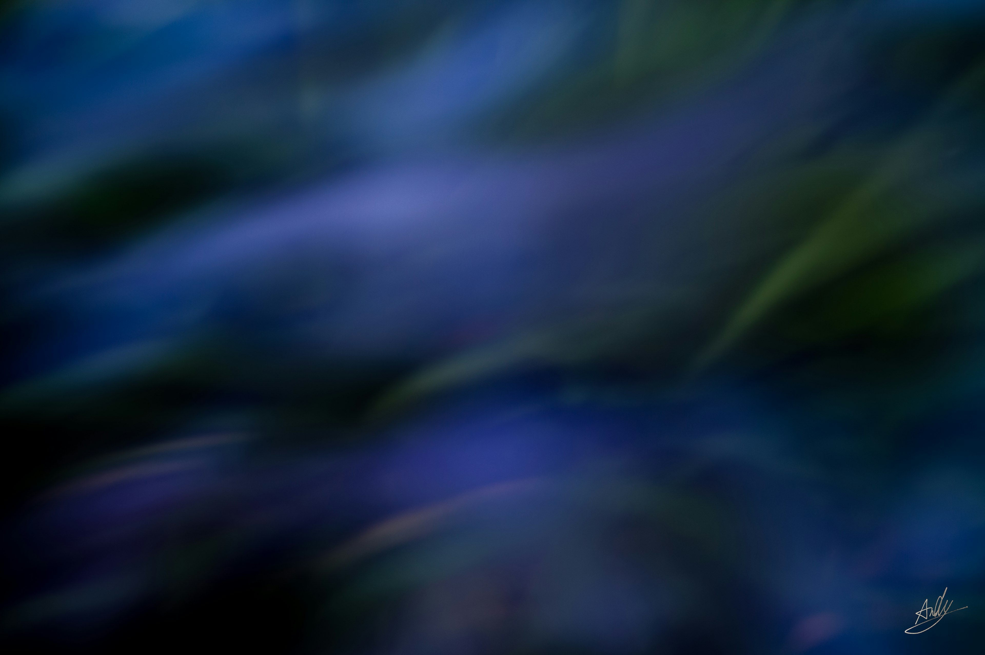 Abstract blurred landscape with shades of blue and green