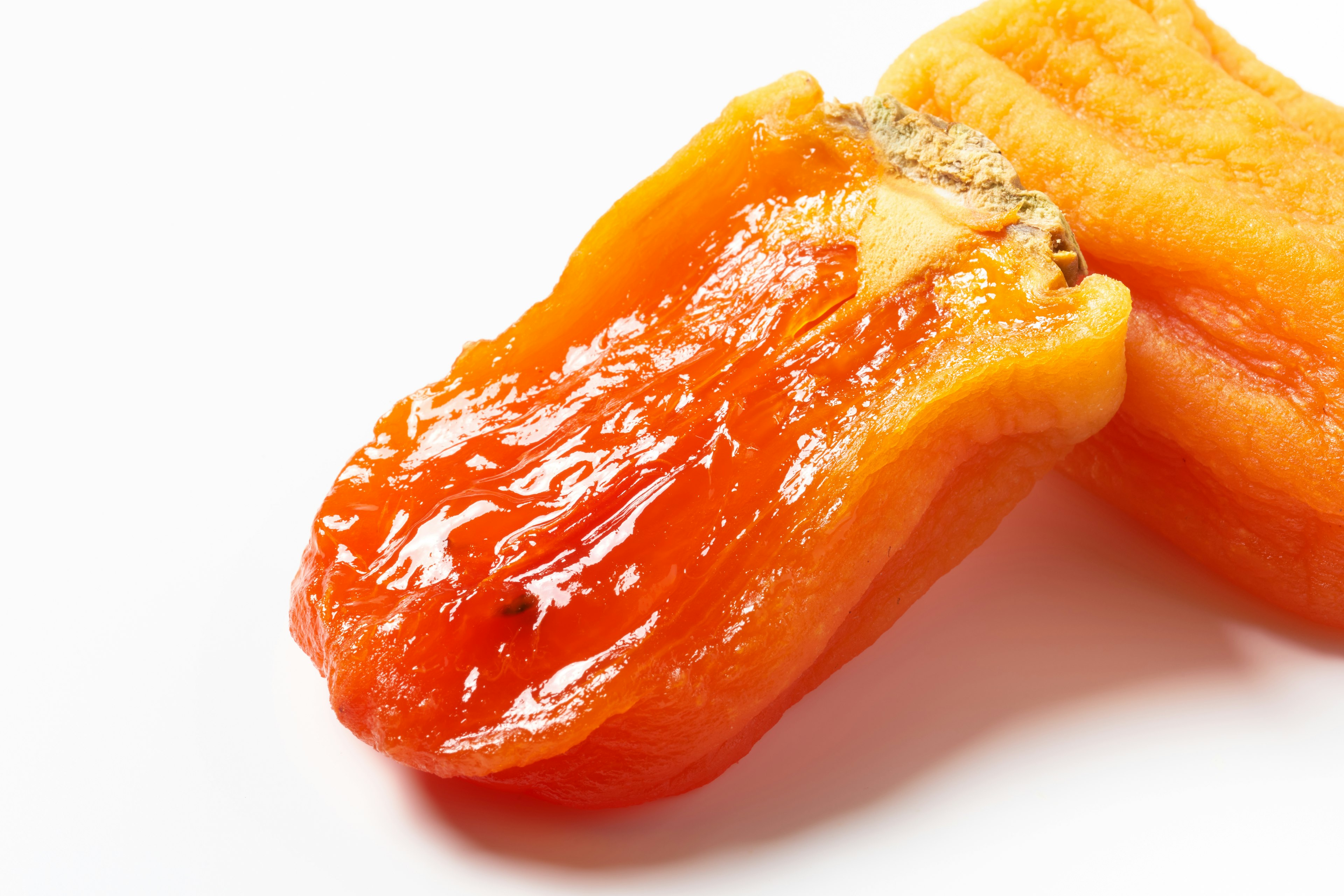 Close-up of dried apricots showcasing their vibrant orange color and texture