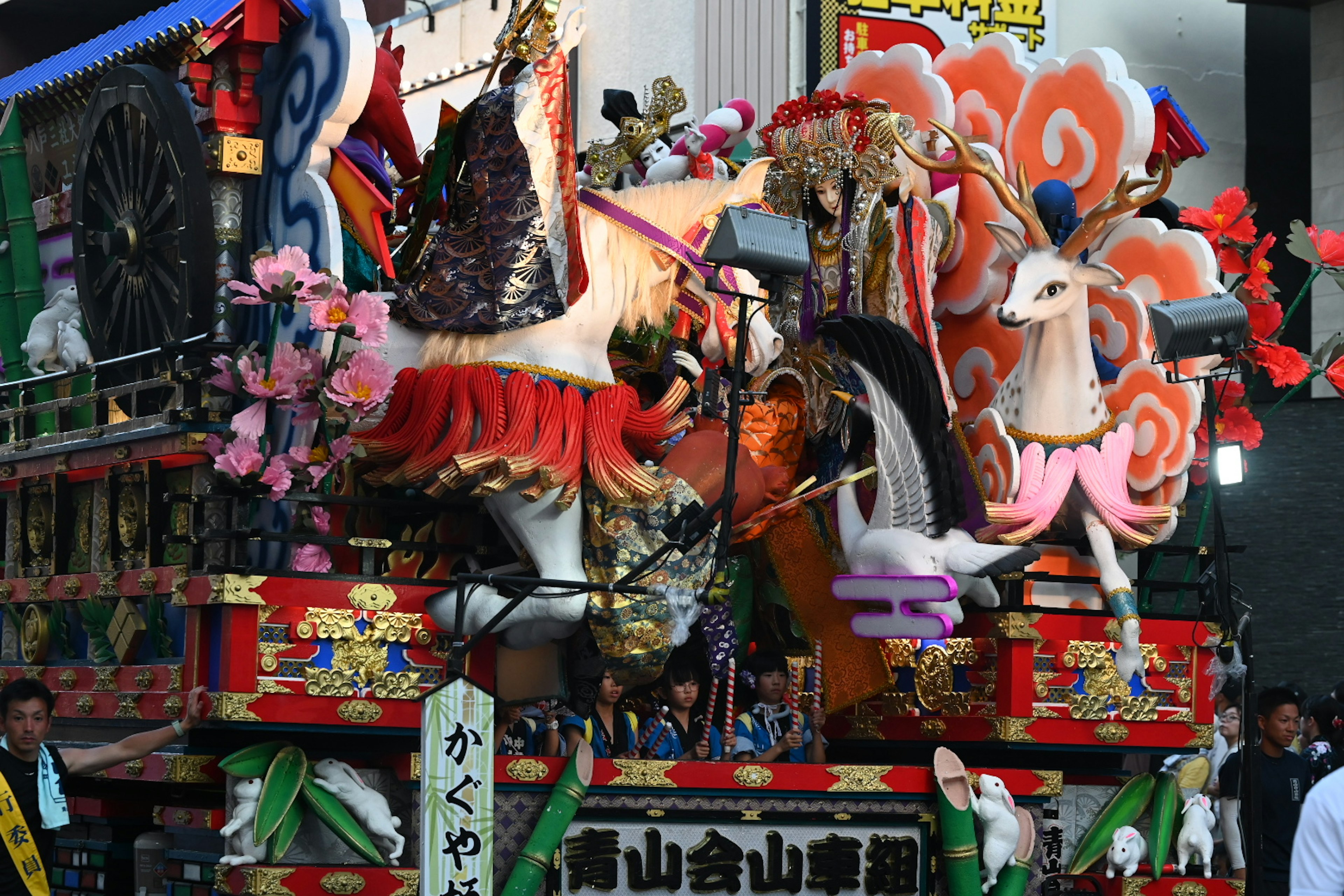 Colorful festival float adorned with intricate designs and decorations