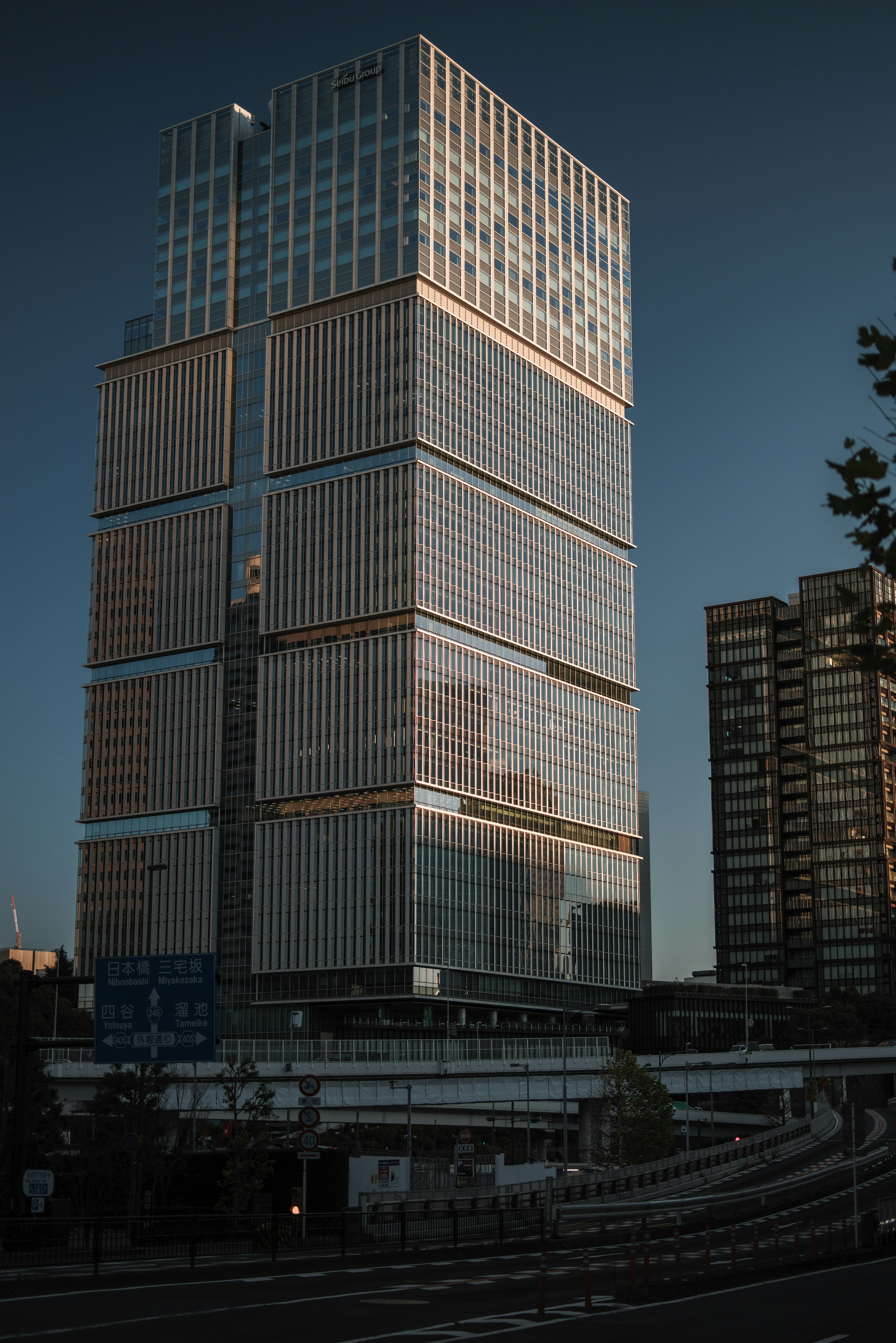 Close-up of a skyscraper, modern design, glass facade, evening light