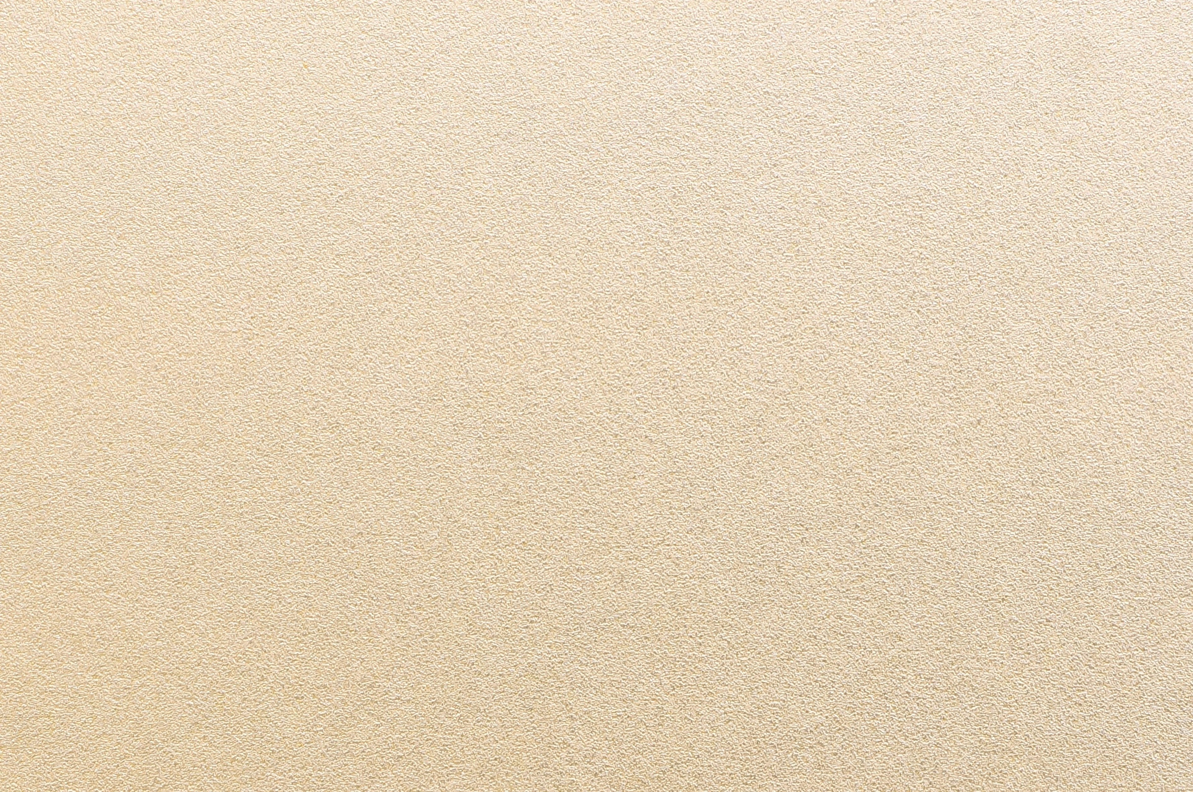 Light beige textured background