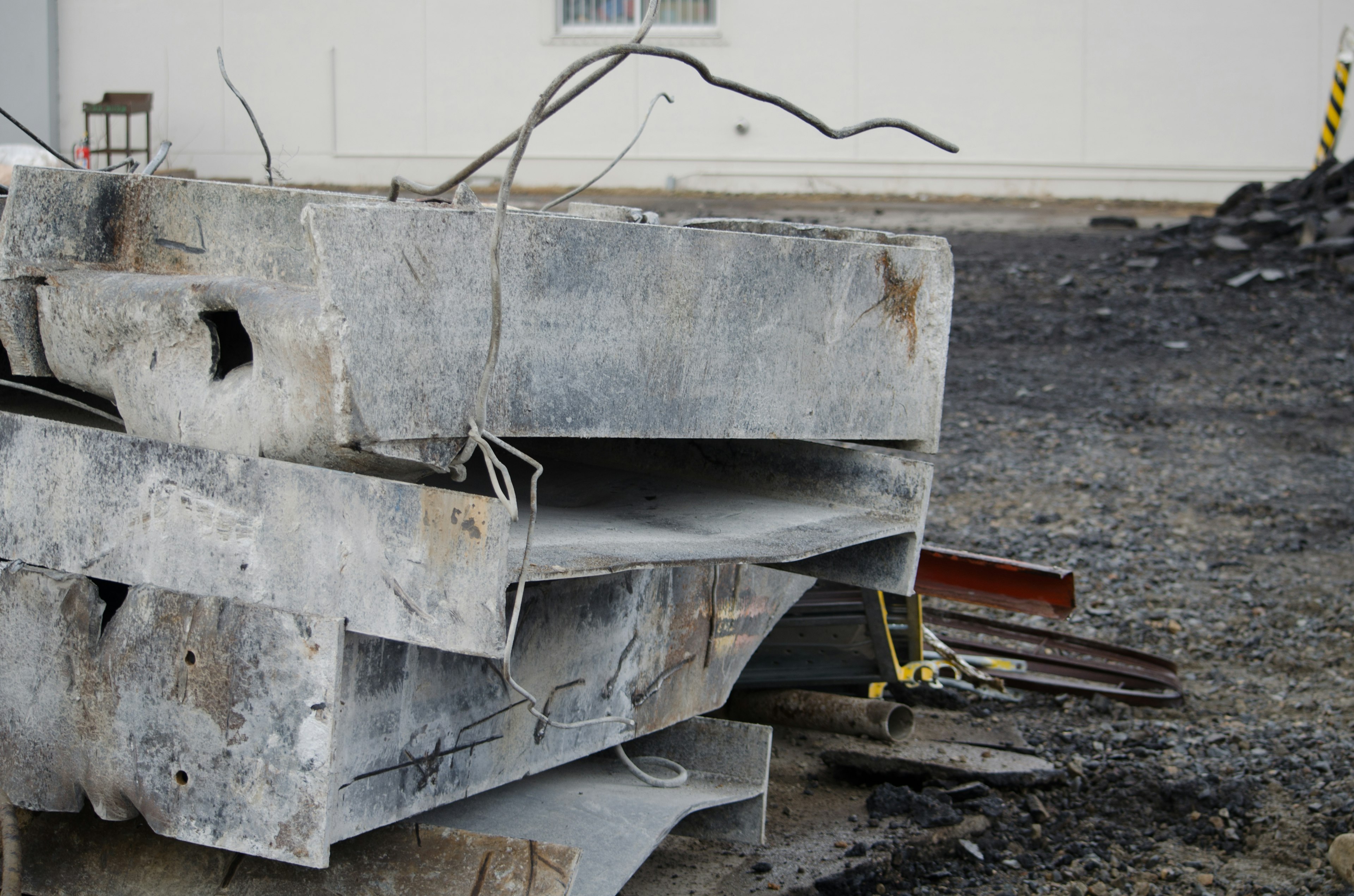 Stacked concrete and metal structures at a construction site